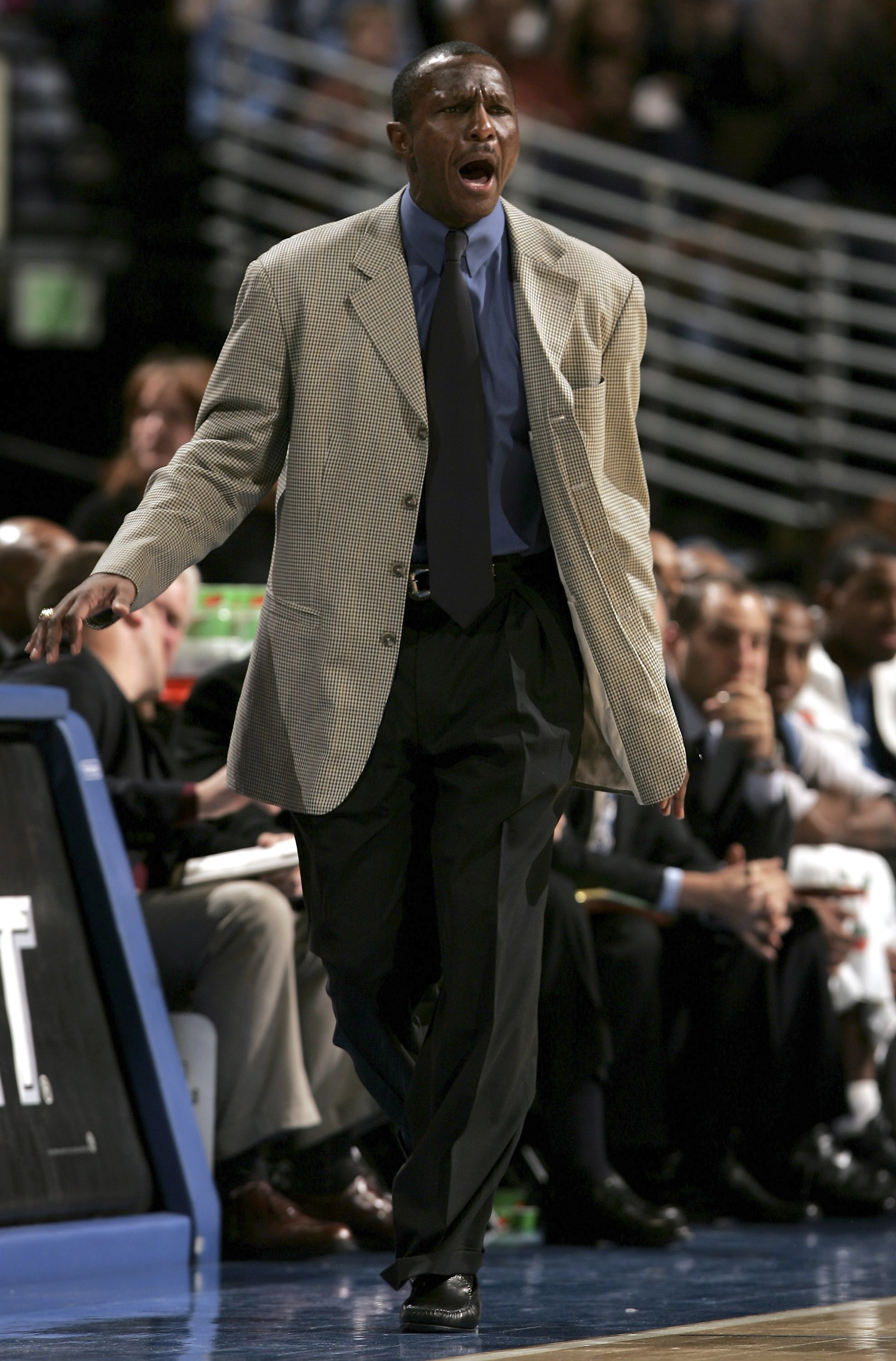 DENVER - NOVEMBER 03:  Head coach Dwane Casey of the Minnesota Timberwolves directs his team as they defeated the Denver Nuggets 112-109 on November 3, 2006 at the Pepsi Center in Denver, Colorado. NOTE TO USER: User expressly acknowledges and agrees that