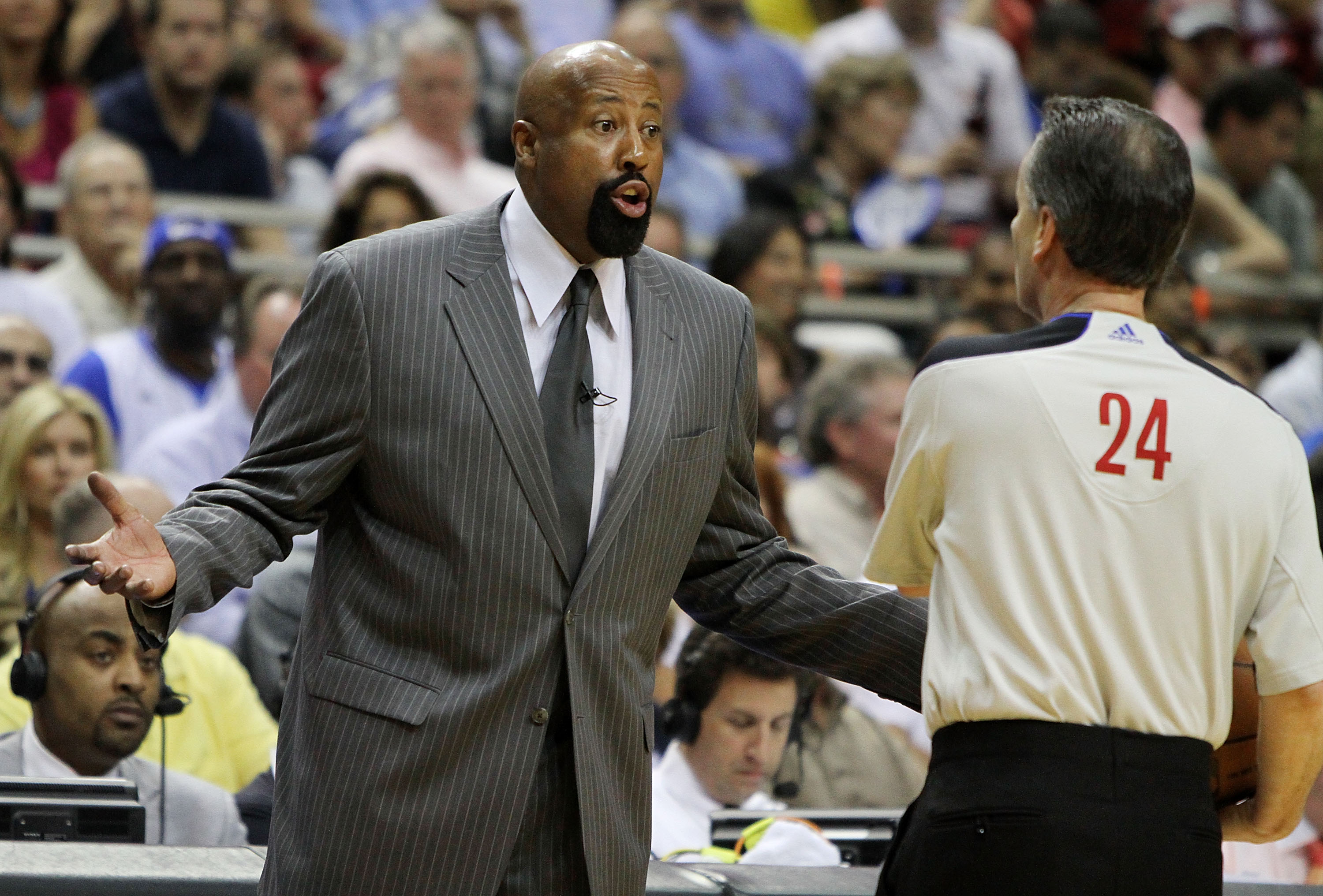 ORLANDO, FL - MAY 06:  Head coach Mike Woodson of the Atlanta Hawks protests to official Mike Callahan #24 while facing the Orlando Magic in Game Two of the Eastern Conference Semifinals during the 2010 NBA Playoffs at Amway Arena on May 6, 2010 in Orland