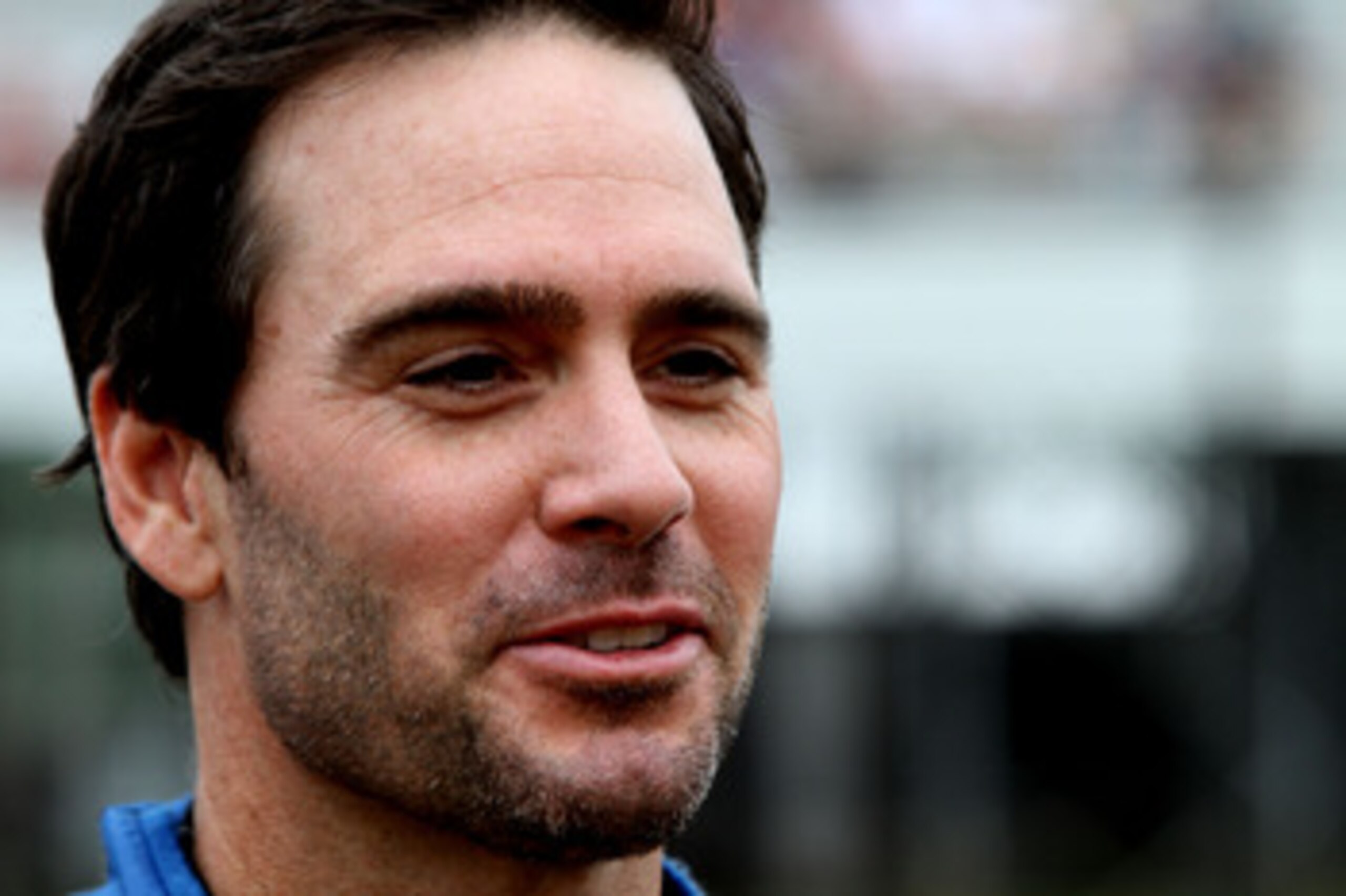LONG POND, PA - JUNE 12:  Jimmie Johnson, driver of the #48 Lowe's Chevrolet, stands on the grid prior to the NASCAR Sprint Cup Series 5-Hour Energy 500 at Pocono Raceway on June 12, 2011 in Long Pond, Pennsylvania.  (Photo by Jerry Markland/Getty Images 