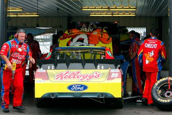 LONG POND, PA - JUNE 12:  Carl Edwards, driver of the #99 Kellogg's Ford, sits in the garage with engine trouble during the NASCAR Sprint Cup Series 5-Hour Energy 500 at Pocono Raceway on June 12, 2011 in Long Pond, Pennsylvania.  (Photo by Jeff Zelevansk