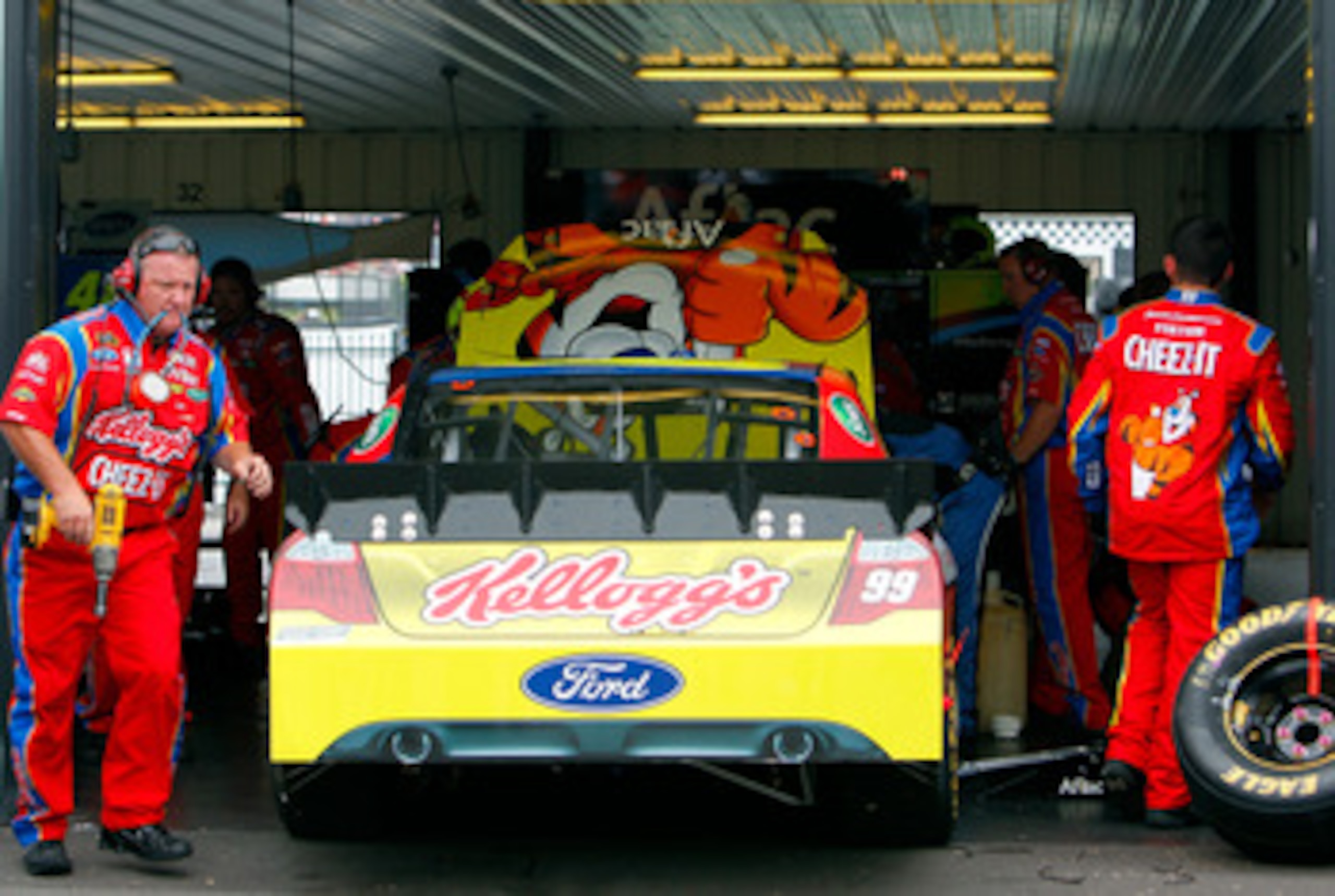 LONG POND, PA - JUNE 12:  Carl Edwards, driver of the #99 Kellogg's Ford, sits in the garage with engine trouble during the NASCAR Sprint Cup Series 5-Hour Energy 500 at Pocono Raceway on June 12, 2011 in Long Pond, Pennsylvania.  (Photo by Jeff Zelevansk