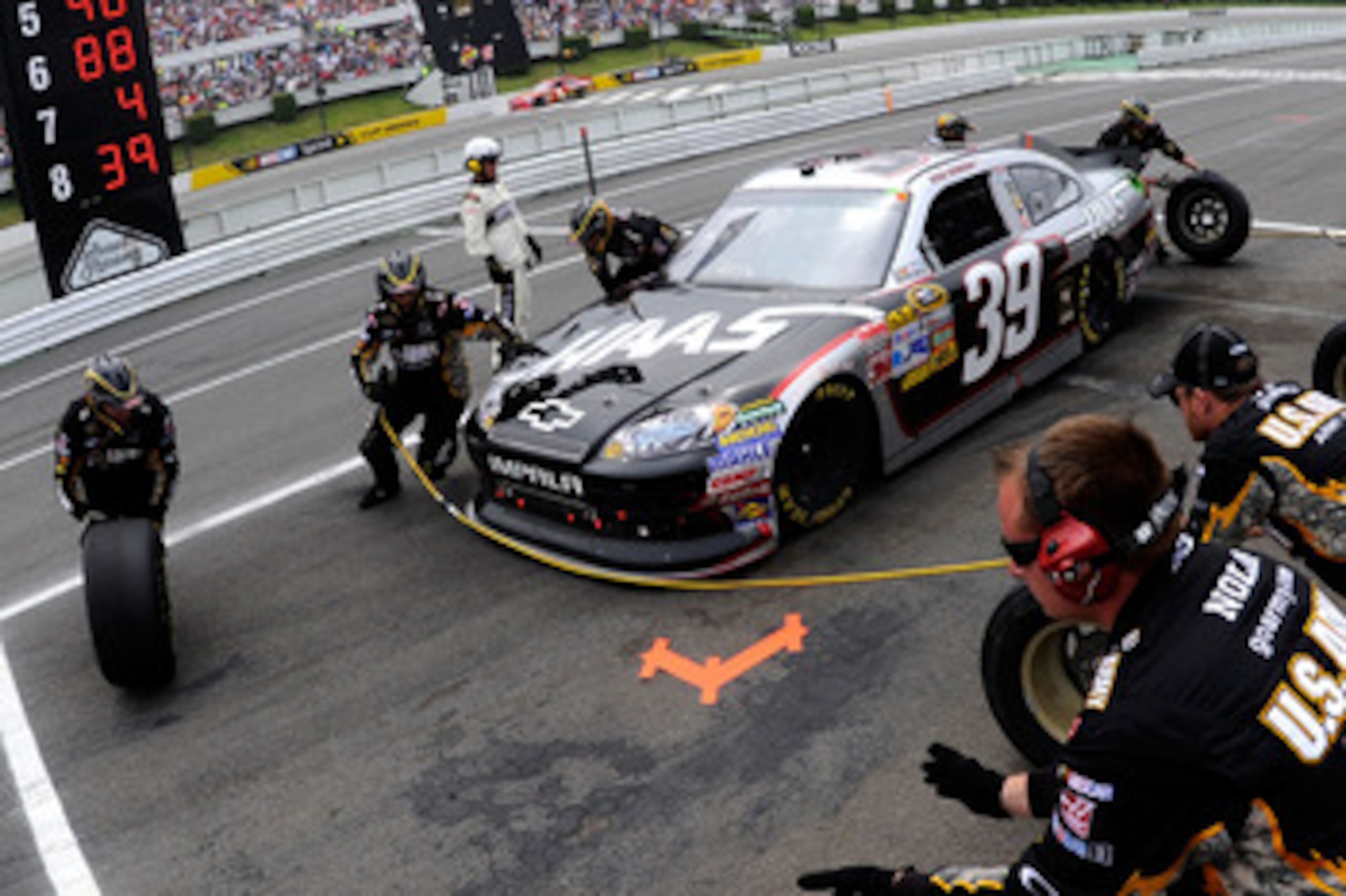 LONG POND, PA - JUNE 12:  Ryan Newman, driver of the #39 Haas Automation Chevrolet, makes a pit stop during the NASCAR Sprint Cup Series 5-Hour Energy 500 at Pocono Raceway on June 12, 2011 in Long Pond, Pennsylvania.  (Photo by John Harrelson/Getty Image