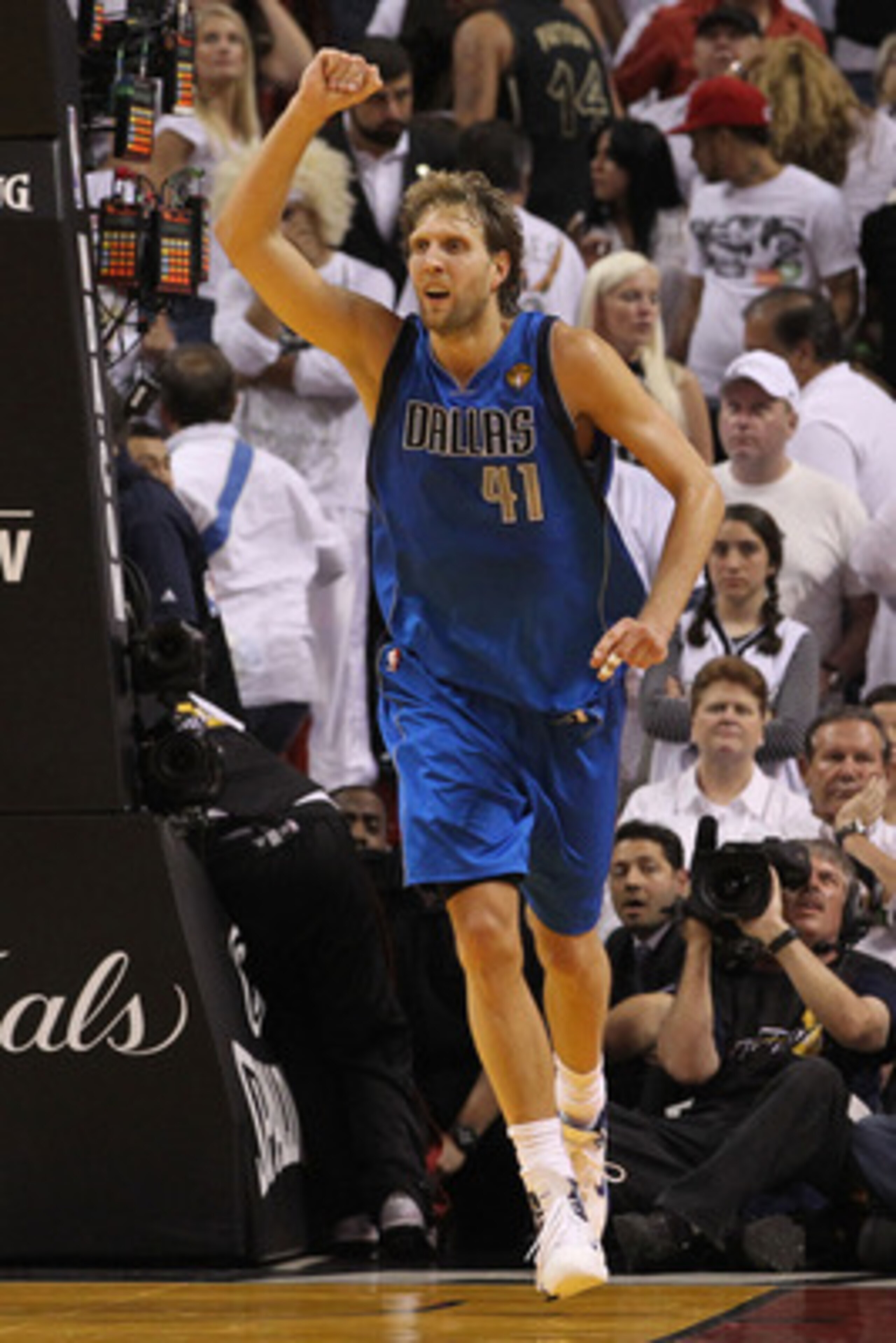 MIAMI, FL - JUNE 12:  Dirk Nowitzki #41 of the Dallas Mavericks celebrates while taking on the Miami Heat in the fourth quarter in Game Six of the 2011 NBA Finals at American Airlines Arena on June 12, 2011 in Miami, Florida. The Mavericks won 105-95. NOT