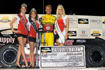 ROSSBURG, OH - JUNE 08:  Clint Bowyer, driver of the #33 Crawford Supply/Klotz Synthetic Lubrication Chevrolet, poses in Victory Lane after winning the running of Prelude To The Dream at Eldora Speedway on June 8, 2011 in Rossburg, Ohio.  (Photo by Jared 