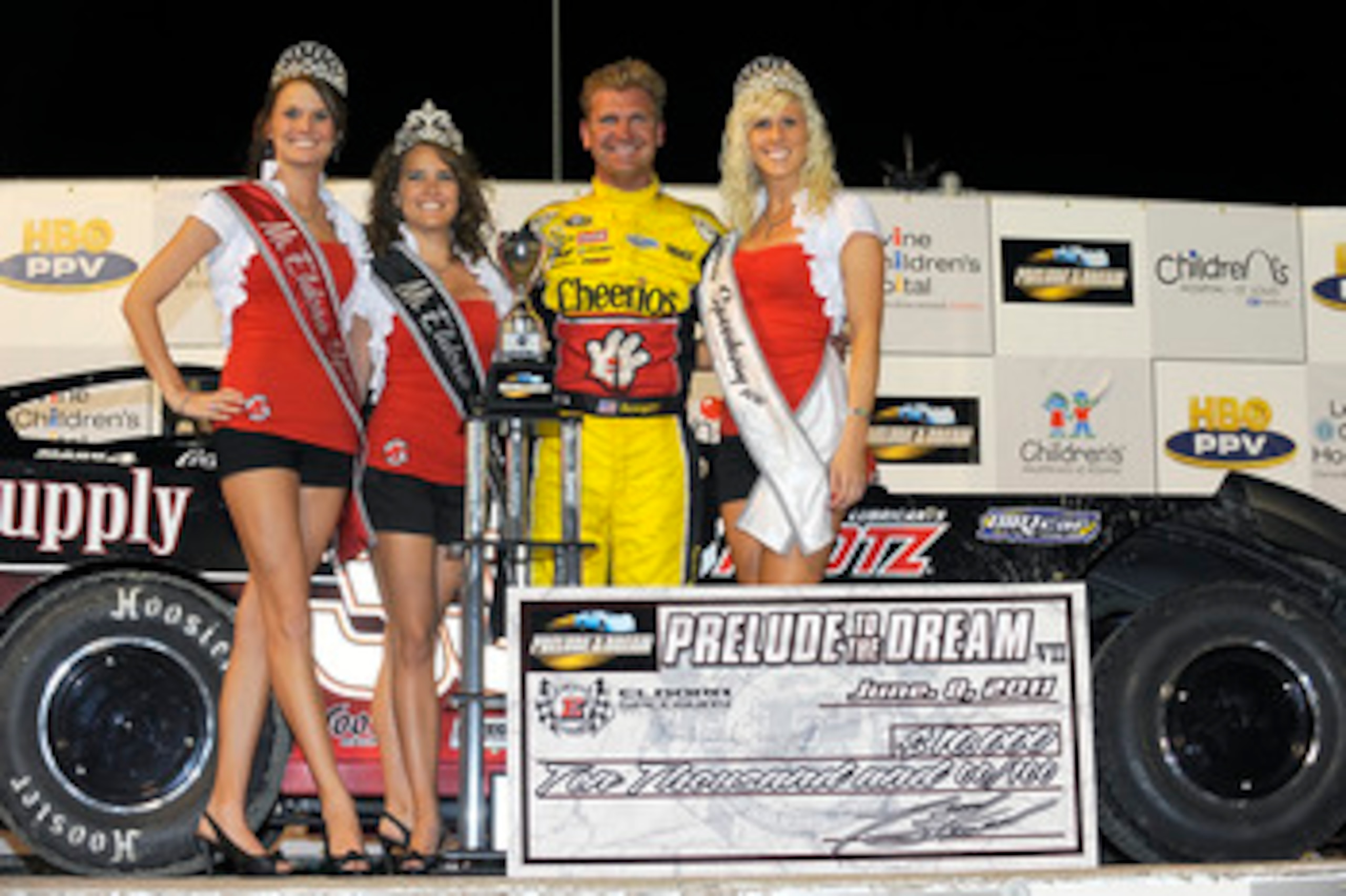 ROSSBURG, OH - JUNE 08:  Clint Bowyer, driver of the #33 Crawford Supply/Klotz Synthetic Lubrication Chevrolet, poses in Victory Lane after winning the running of Prelude To The Dream at Eldora Speedway on June 8, 2011 in Rossburg, Ohio.  (Photo by Jared 