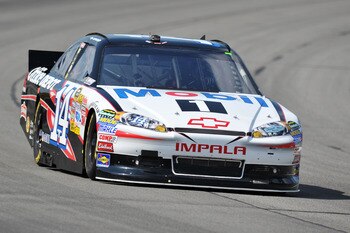 LONG POND, PA - JUNE 10:  Tony Stewart, driver of the #14 Mobil 1/Office Depot Chevrolet, practices for the NASCAR Sprint Cup Series 5-Hour Energy 500 at Pocono Raceway on June 10, 2011 in Long Pond, Pennsylvania.  (Photo by Drew Hallowell/Getty Images fo