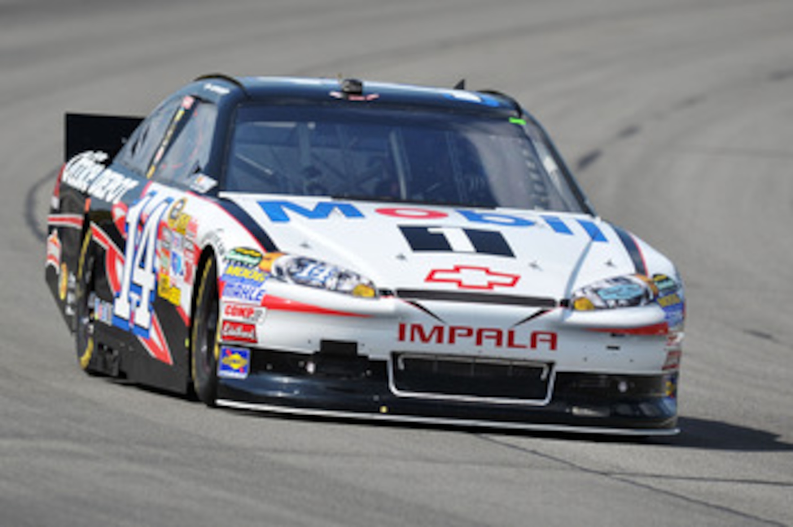 LONG POND, PA - JUNE 10:  Tony Stewart, driver of the #14 Mobil 1/Office Depot Chevrolet, practices for the NASCAR Sprint Cup Series 5-Hour Energy 500 at Pocono Raceway on June 10, 2011 in Long Pond, Pennsylvania.  (Photo by Drew Hallowell/Getty Images fo