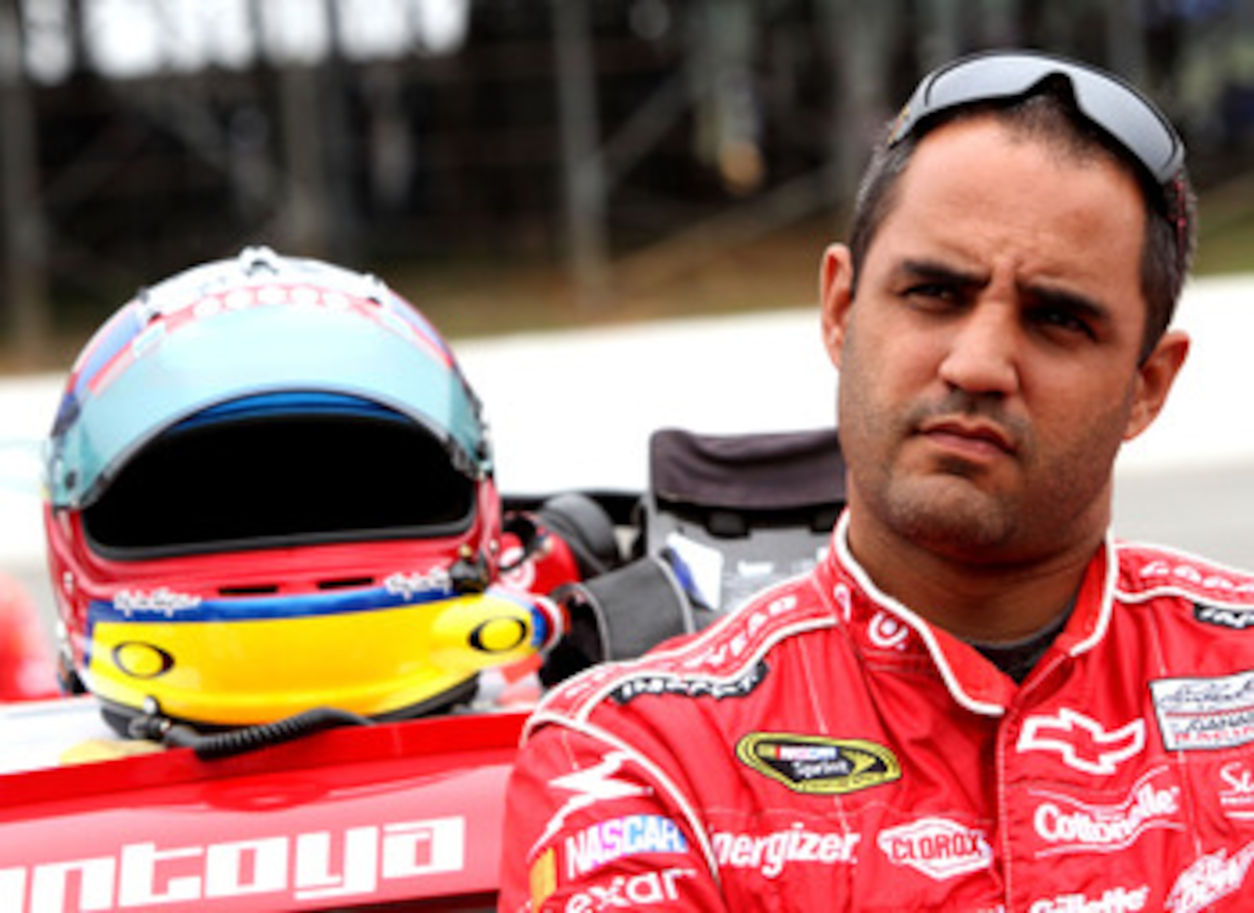 LONG POND, PA - JUNE 12:  Juan Pablo Montoya, driver of the #42 Target Chevrolet, stands on the grid prior to the NASCAR Sprint Cup Series 5-Hour Energy 500 at Pocono Raceway on June 12, 2011 in Long Pond, Pennsylvania.  (Photo by Jerry Markland/Getty Ima