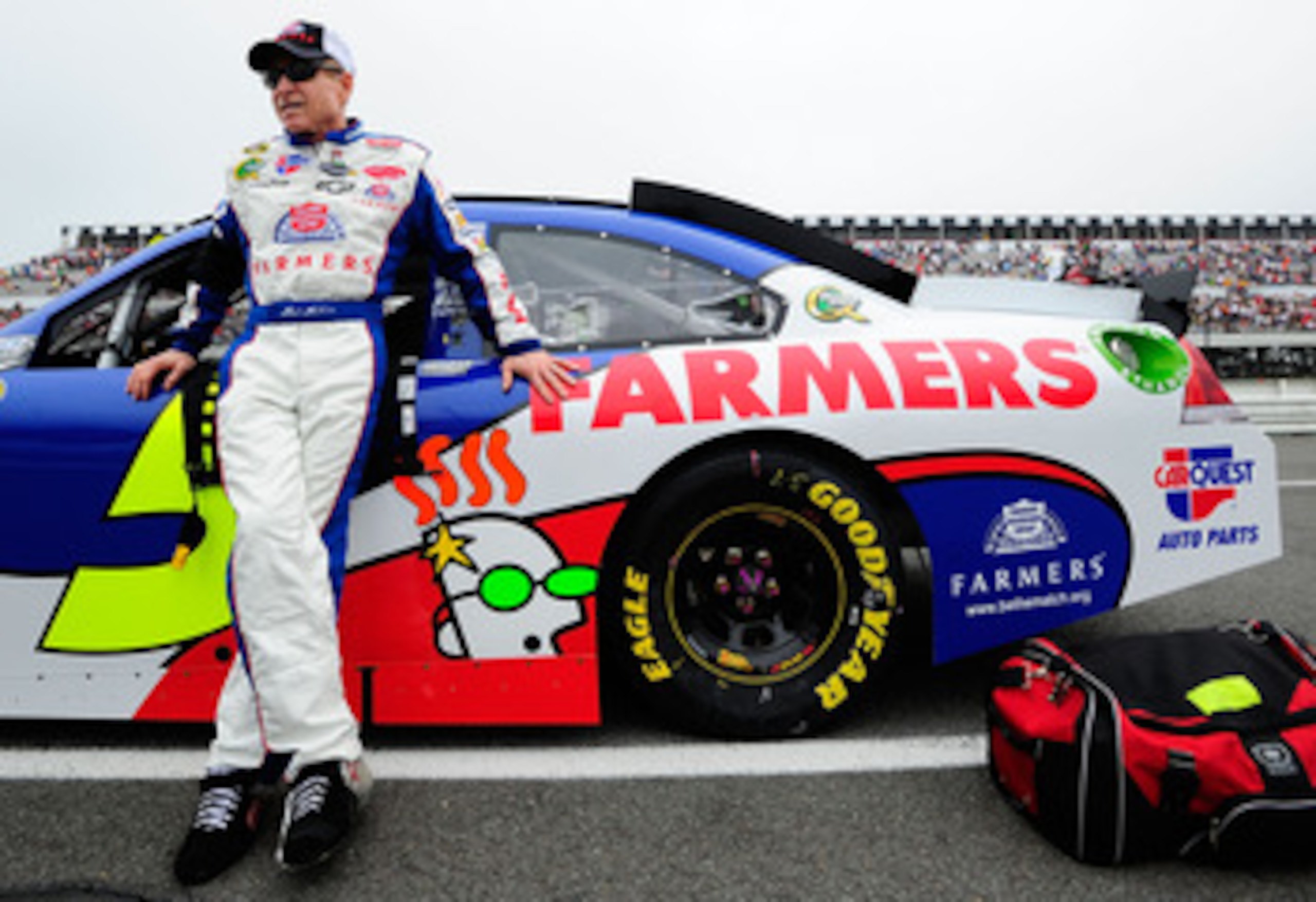 LONG POND, PA - JUNE 12:  Mark Martin, driver of the #5 Farmers Insurance/GoDaddy.com Chevrolet, stands on the grid prior to the NASCAR Sprint Cup Series 5-Hour Energy 500 at Pocono Raceway on June 12, 2011 in Long Pond, Pennsylvania.  (Photo by Jason Smi