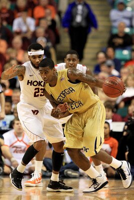 GREENSBORO, NC - MARCH 10:  Iman Shumpert #1 of the Georgia Tech Yellow Jackets drives against Malcolm Delaney #23 of the Virginia Tech Hokies during the first half of the game in the first round of the 2011 ACC men's basketball tournament at the Greensbo