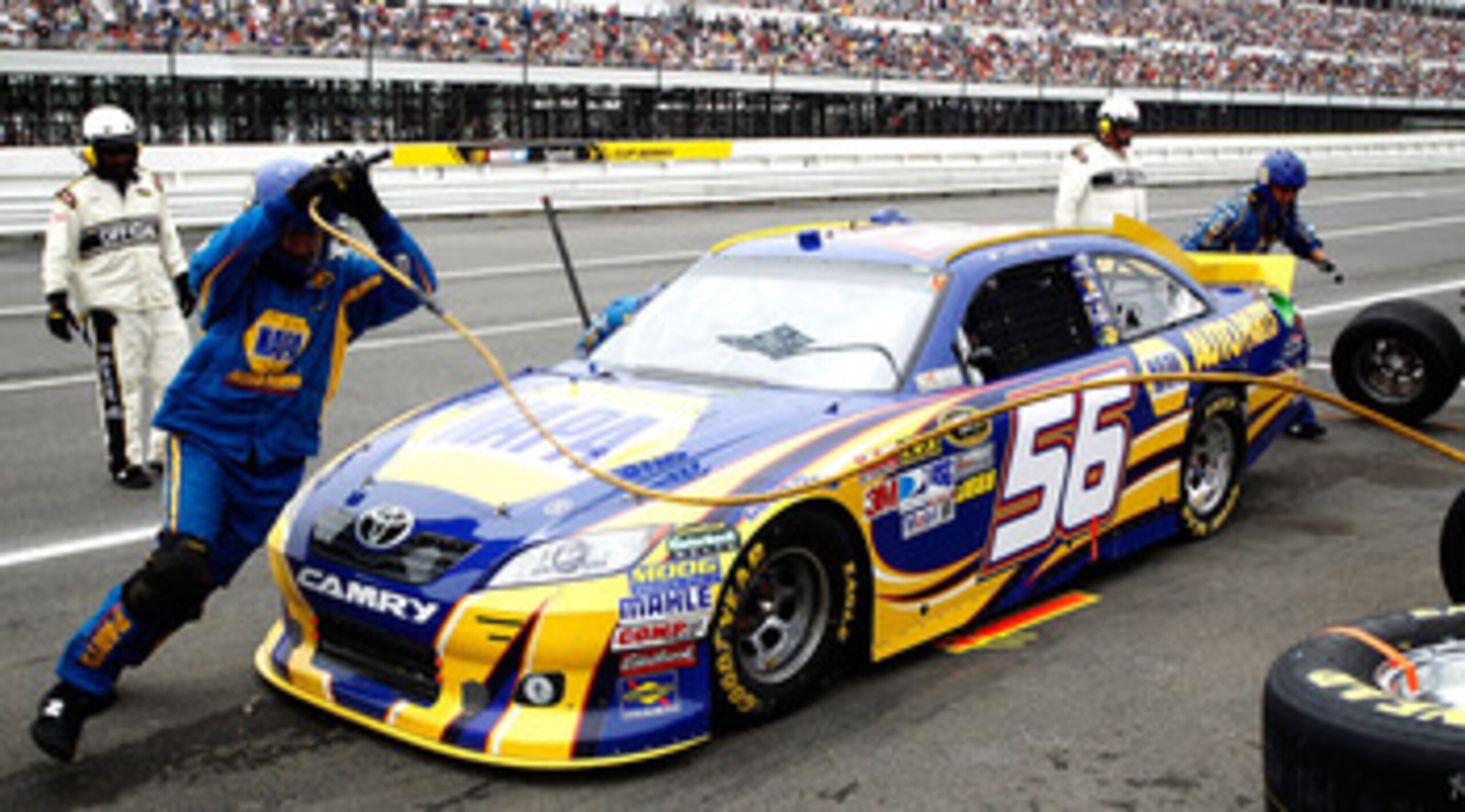 LONG POND, PA - JUNE 12: Martin Truex Jr., driver of the #56 NAPA Auto Parts Toyota, comes in for a pit stop during the NASCAR Sprint Cup Series 5-Hour Energy 500 at Pocono Raceway on June 12, 2011 in Long Pond, Pennsylvania.  (Photo by Jeff Zelevansky/Ge