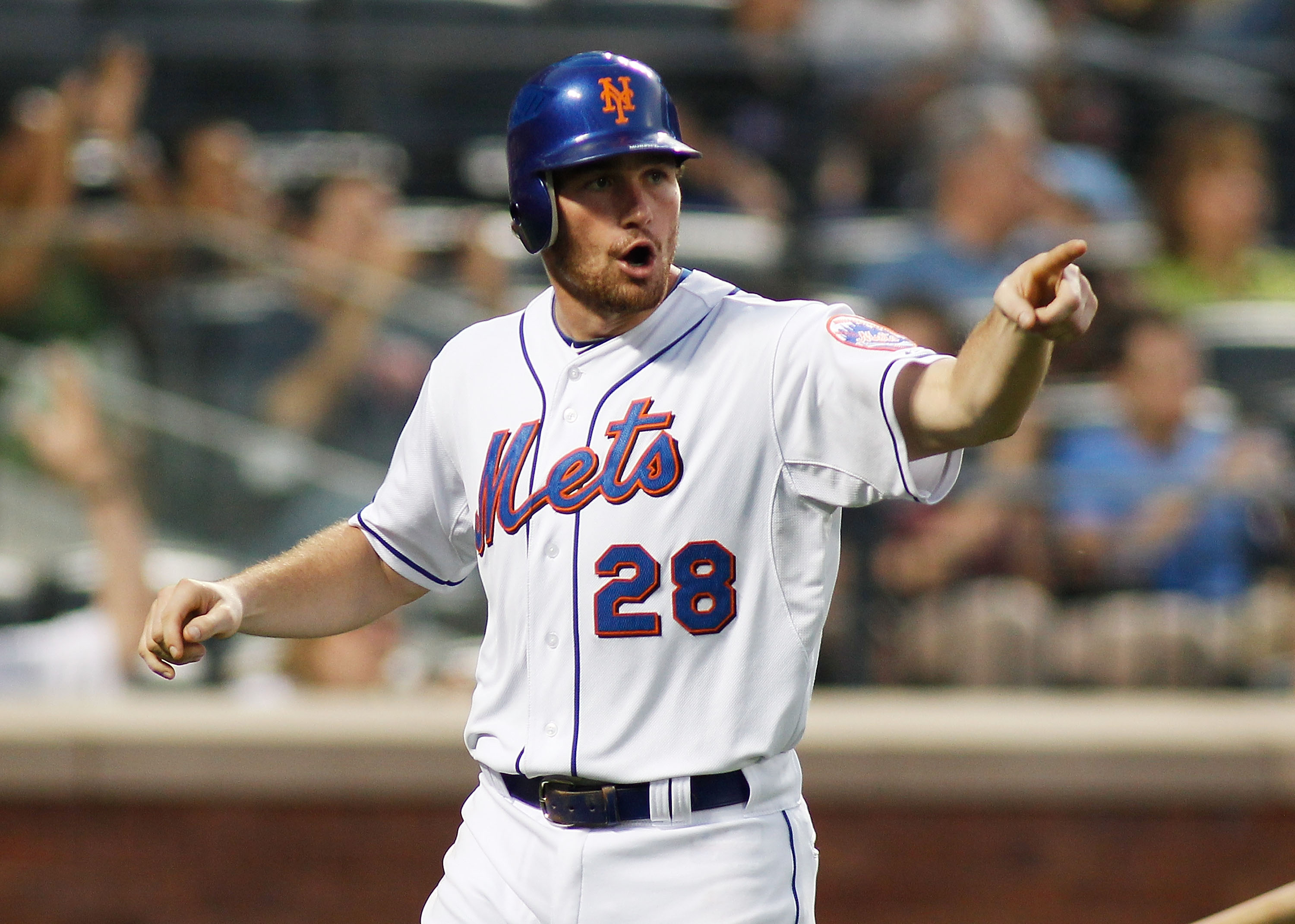 NEW YORK - JUNE 01: Daniel Murphy #28 of the New York Mets celebrates after scoring on Ruben Tejada #11 (not pictured) two-run single in the fourth inning against the Pittsburgh Pirates on June 1, 2011 at Citi Field in the Flushing neighborhood of the Qu NEW YORK - JUNE 01: Daniel Murphy #28 of the New York Mets celebrates after scoring on Ruben Tejada #11 (not pictured) two-run single in the fourth inning against the Pittsburgh Pirates on June 1, 2011 at Citi Field in the Flushing neighborhood of the Qu