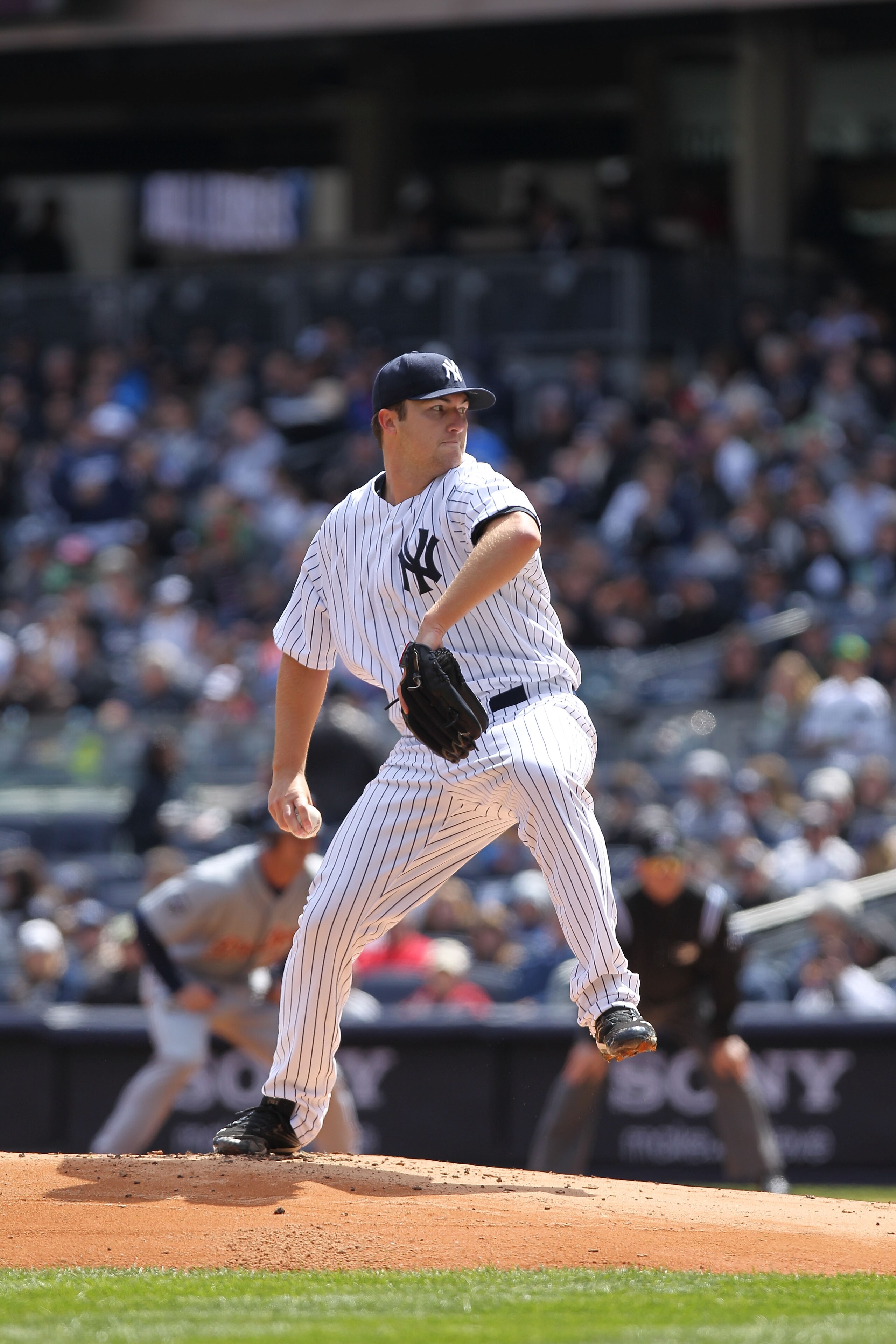 NEW YORK, NY - APRIL 03:  Phil Hughes #65 of the New York Yankees pitches against the Detroit Tigers at Yankee Stadium on April 3, 2011 in the Bronx borough of New York City.  (Photo by Nick Laham/Getty Images)