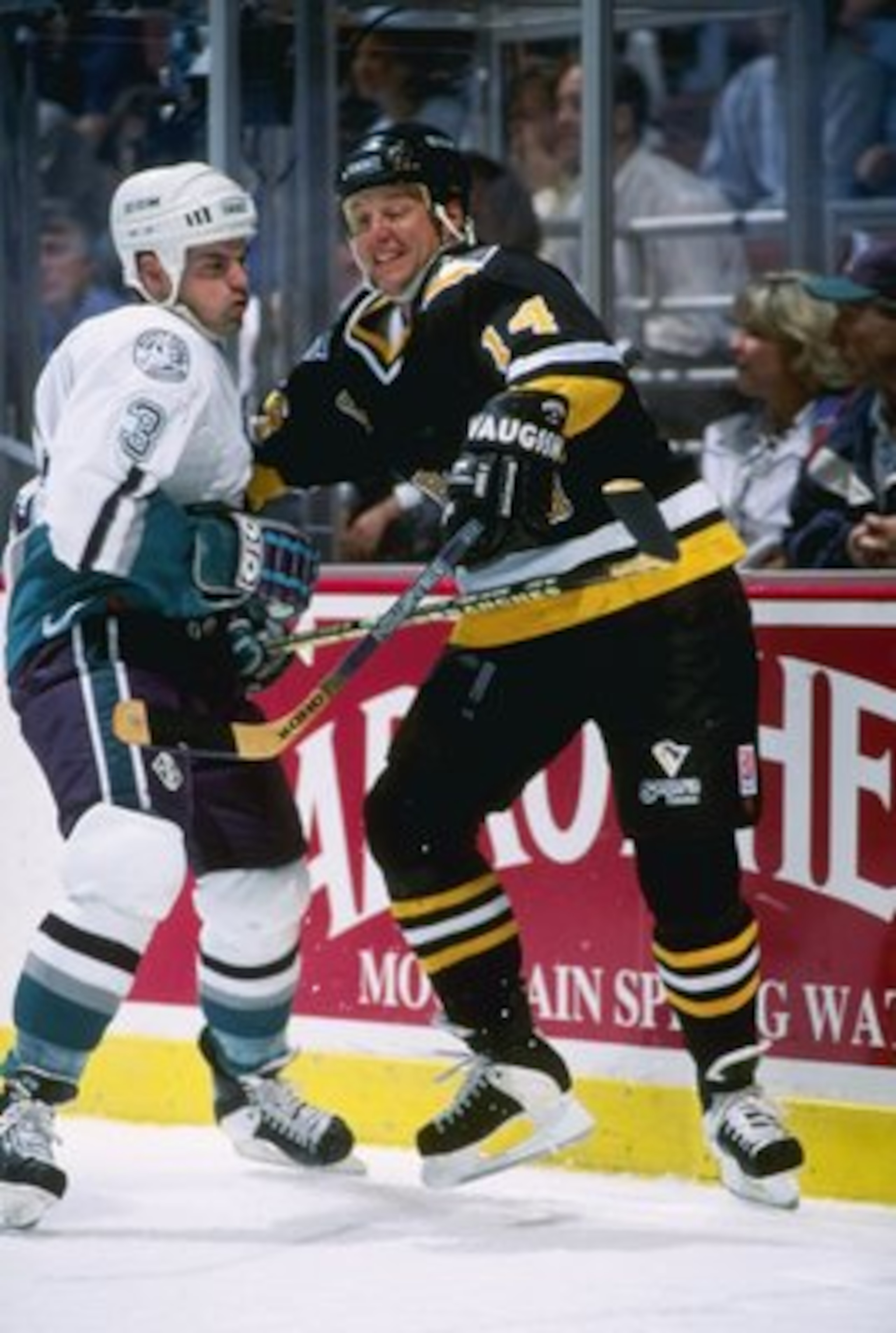 25 Sep 1996:  Rightwinger Brad Lauer of the Pittsburgh Penguins (right) and Anaheim Mighty Ducks defenseman Jason York tangle up during a game at Arrowhead Pond in Anaheim, California.  The Ducks won the game, 6-1. Mandatory Credit: Glenn Cratty  /Allspor