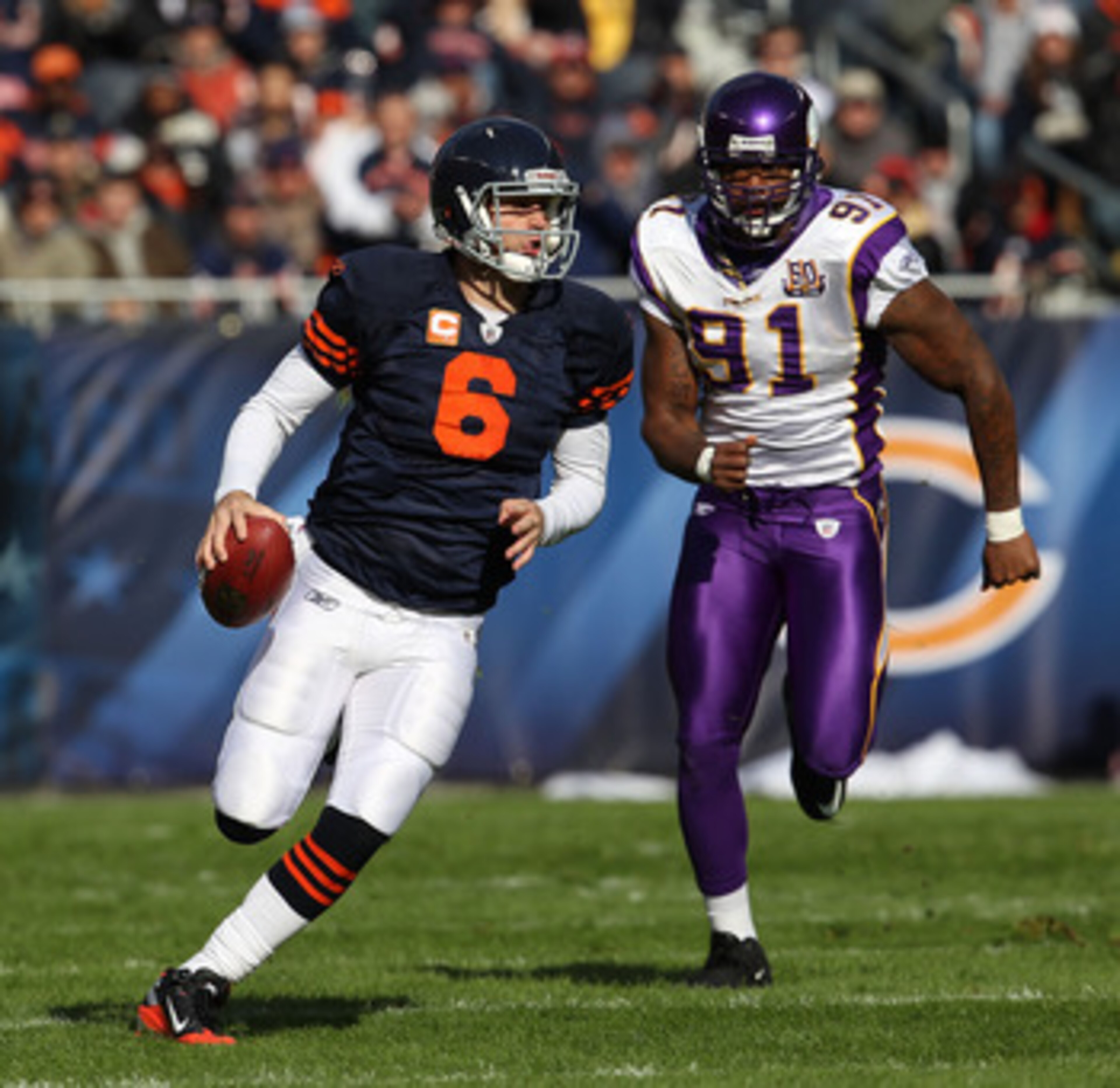 CHICAGO - NOVEMBER 14: Jay Cutler #6 of the Chicago Bears runs for a first down as Ray Edwards #91 of the Minnesota Vikings gives chase at Soldier Field on November 14, 2010 in Chicago, Illinois. The Bears defeated the Vikings 27-13. (Photo by Jonathan Da CHICAGO - NOVEMBER 14: Jay Cutler #6 of the Chicago Bears runs for a first down as Ray Edwards #91 of the Minnesota Vikings gives chase at Soldier Field on November 14, 2010 in Chicago, Illinois. The Bears defeated the Vikings 27-13. (Photo by Jonathan Da
