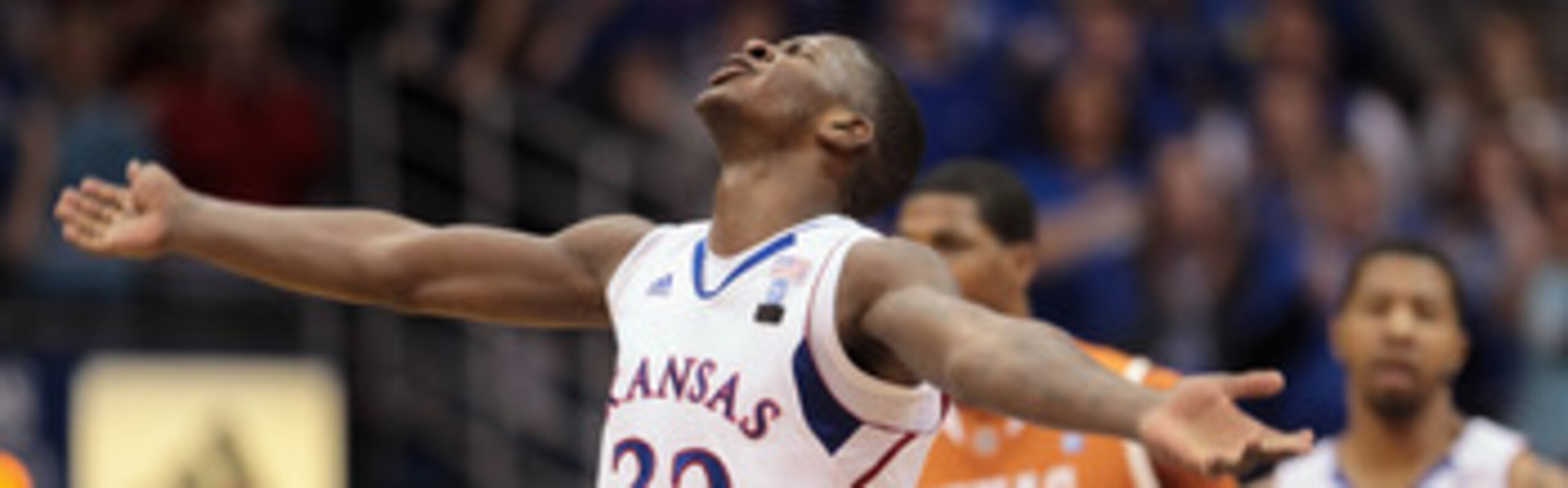LAWRENCE, KS - JANUARY 22:  Josh Selby #32 of the Kansas Jayhawks reacts after scoring during the game against the Texas Longhorns on January 22, 2011 at Allen Fieldhouse in Lawrence, Kansas.  (Photo by Jamie Squire/Getty Images)