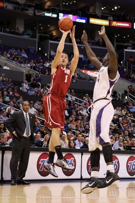 LOS ANGELES, CA - MARCH 10:  Klay Thompson #1 of the Washington State Cougars shoots over Darnell Gant #44 of the Washington Huskies in the first half in the quarterfinals of the 2011 Pacific Life Pac-10 Men's Basketball Tournament at Staples Center on Ma