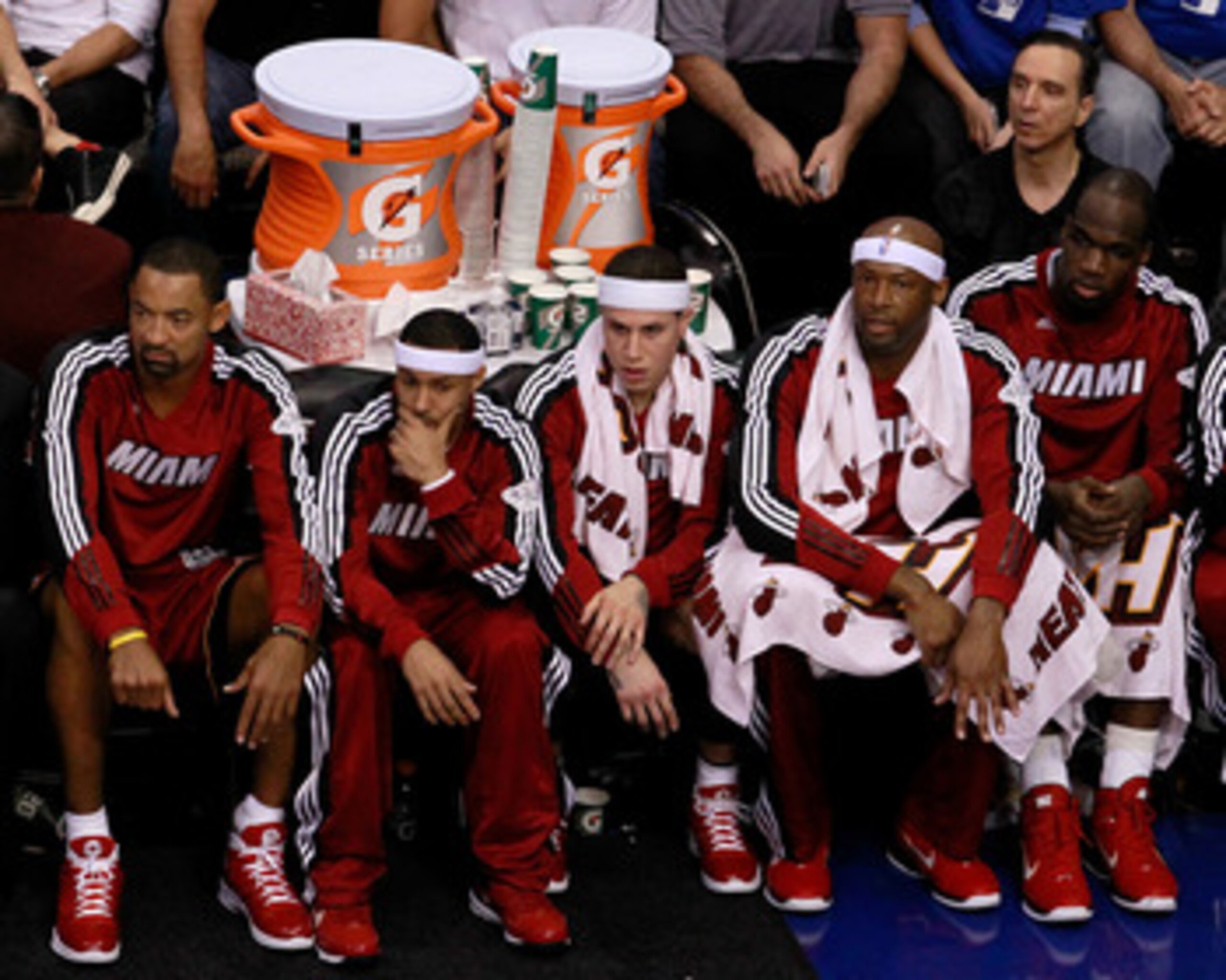 DALLAS, TX - JUNE 05:  (L-R) Juwan Howard #5, Eddie House #55, Mike Bibby #0, Erick Dampier #25, Joel Anthony #50 and LeBron James #6 of the Miami Heat sit on the bench while taking on the Dallas Mavericks in Game Three of the 2011 NBA Finals at American