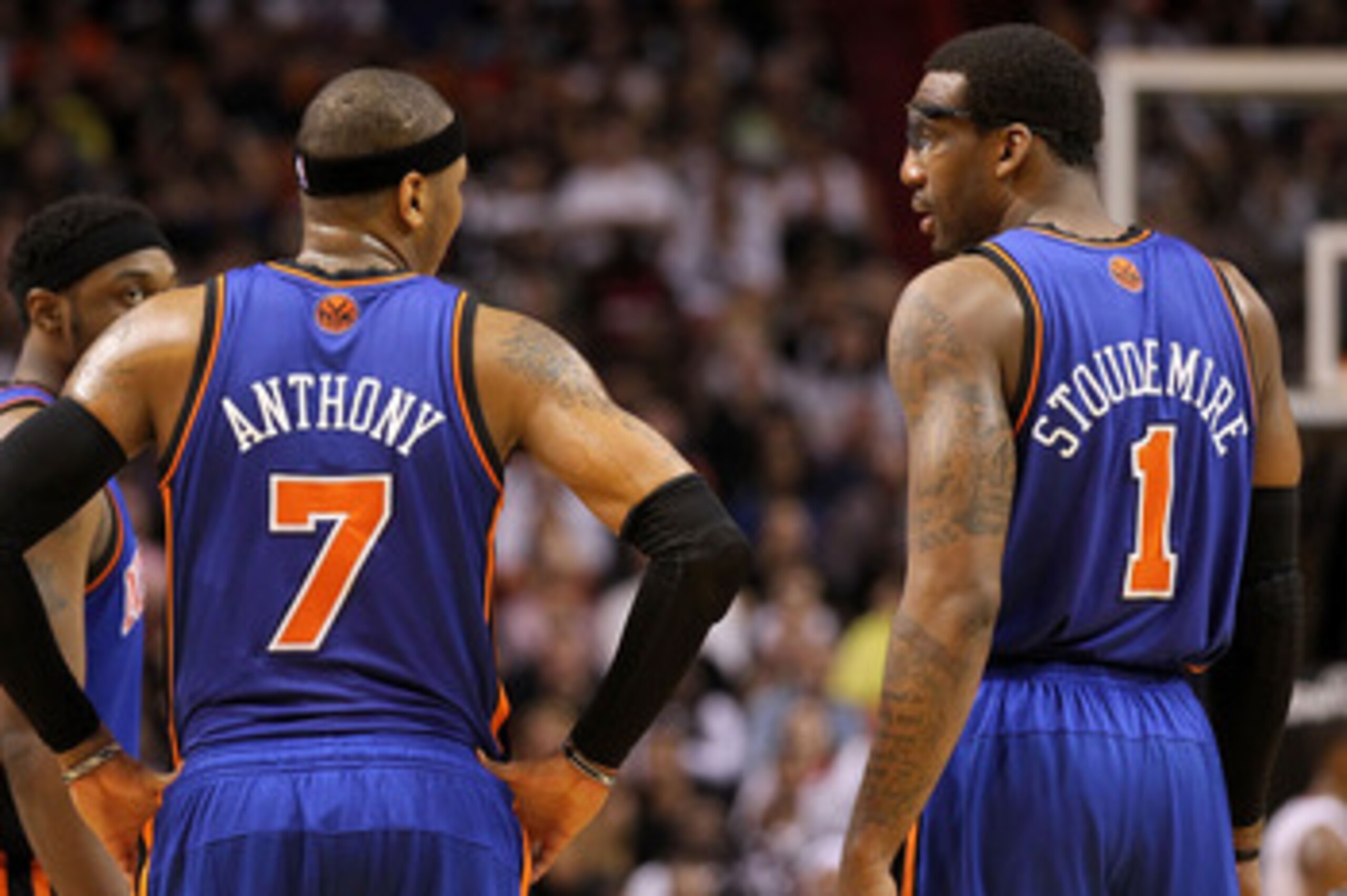 MIAMI, FL - FEBRUARY 27:  Carmelo Anthony #7 and Amar'e Stoudemire #1 of the New York Knicks talk during a game against the the Miami Heat at American Airlines Arena on February 27, 2011 in Miami, Florida. NOTE TO USER: User expressly acknowledges and agr