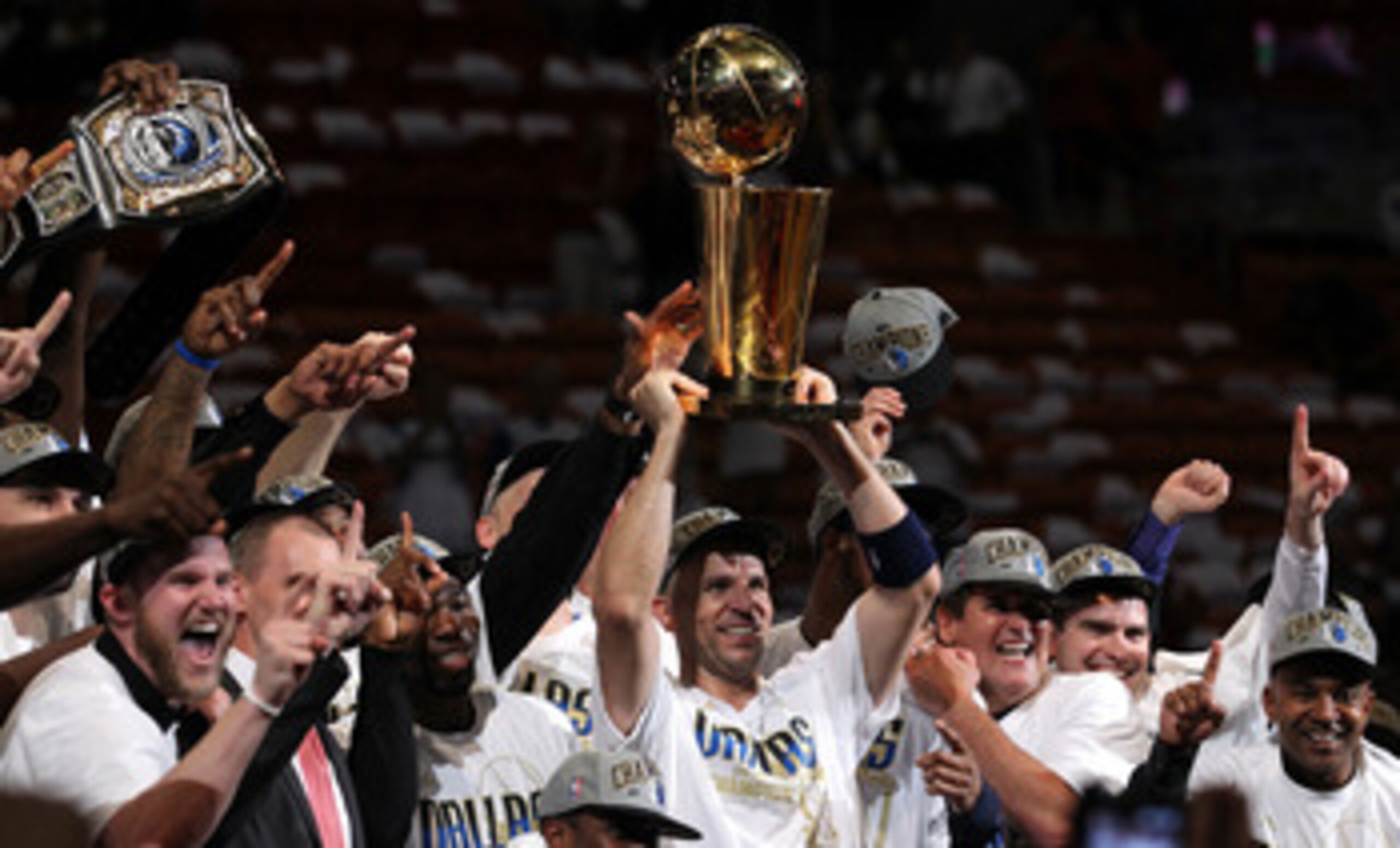 MIAMI, FL - JUNE 12: Jason Kidd #2 of the Dallas Mavericks holds the Larry O'Brien trophy after the Mavericks won 105-95 against the Miami Heat in Game Six of the 2011 NBA Finals at American Airlines Arena on June 12, 2011 in Miami, Florida. NOTE TO USER MIAMI, FL - JUNE 12: Jason Kidd #2 of the Dallas Mavericks holds the Larry O'Brien trophy after the Mavericks won 105-95 against the Miami Heat in Game Six of the 2011 NBA Finals at American Airlines Arena on June 12, 2011 in Miami, Florida. NOTE TO USER
