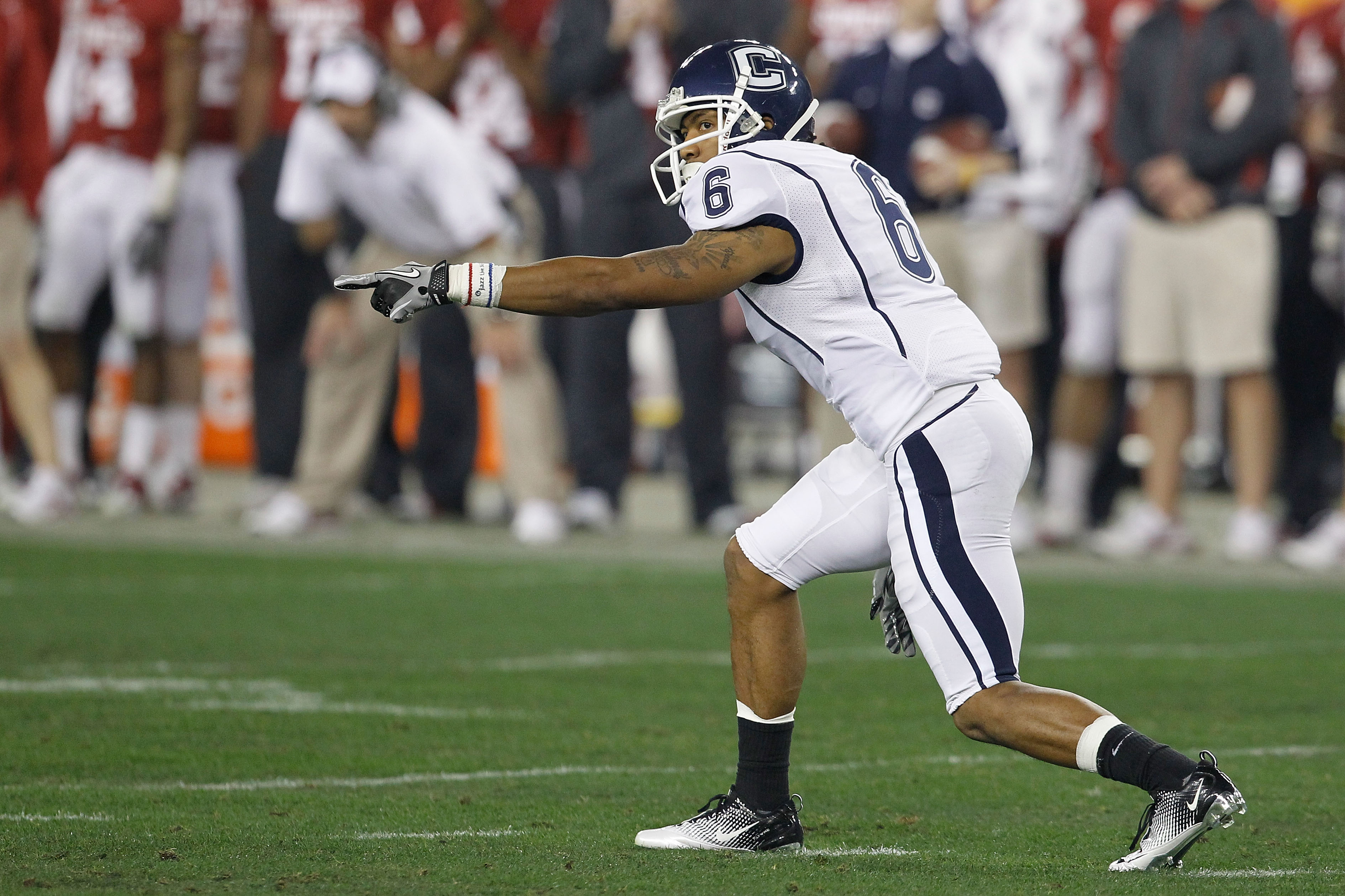 GLENDALE, AZ - JANUARY 01:  Kashif Moore #6 of the Connecticut Huskies looks on in the second half while taking on the Oklahoma Sooners during the Tostitos Fiesta Bowl at the Universtity of Phoenix Stadium on January 1, 2011 in Glendale, Arizona. Moore, w