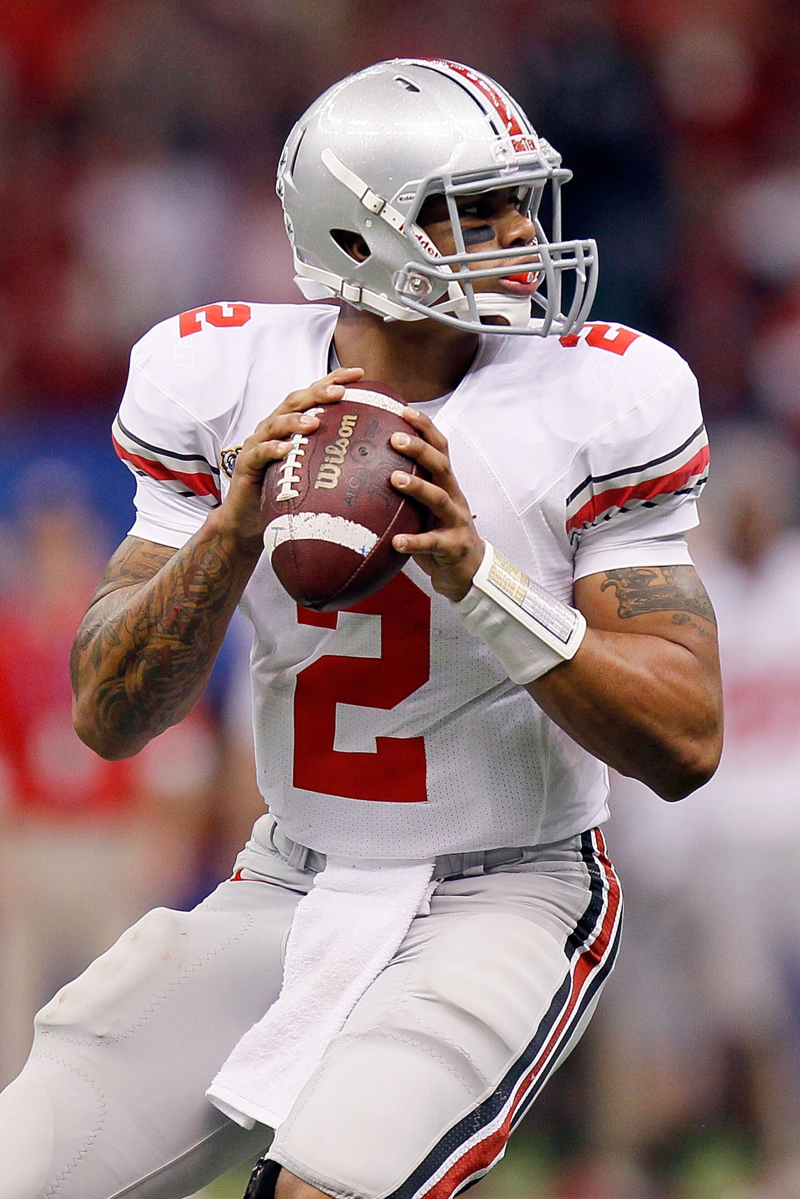 NEW ORLEANS, LA - JANUARY 04:  Quarterback Terrelle Pryor #2 of the Ohio State Buckeyes looks to pass against the Arkansas Razorbacks during the Allstate Sugar Bowl at the Louisiana Superdome on January 4, 2011 in New Orleans, Louisiana.  (Photo by Kevin 