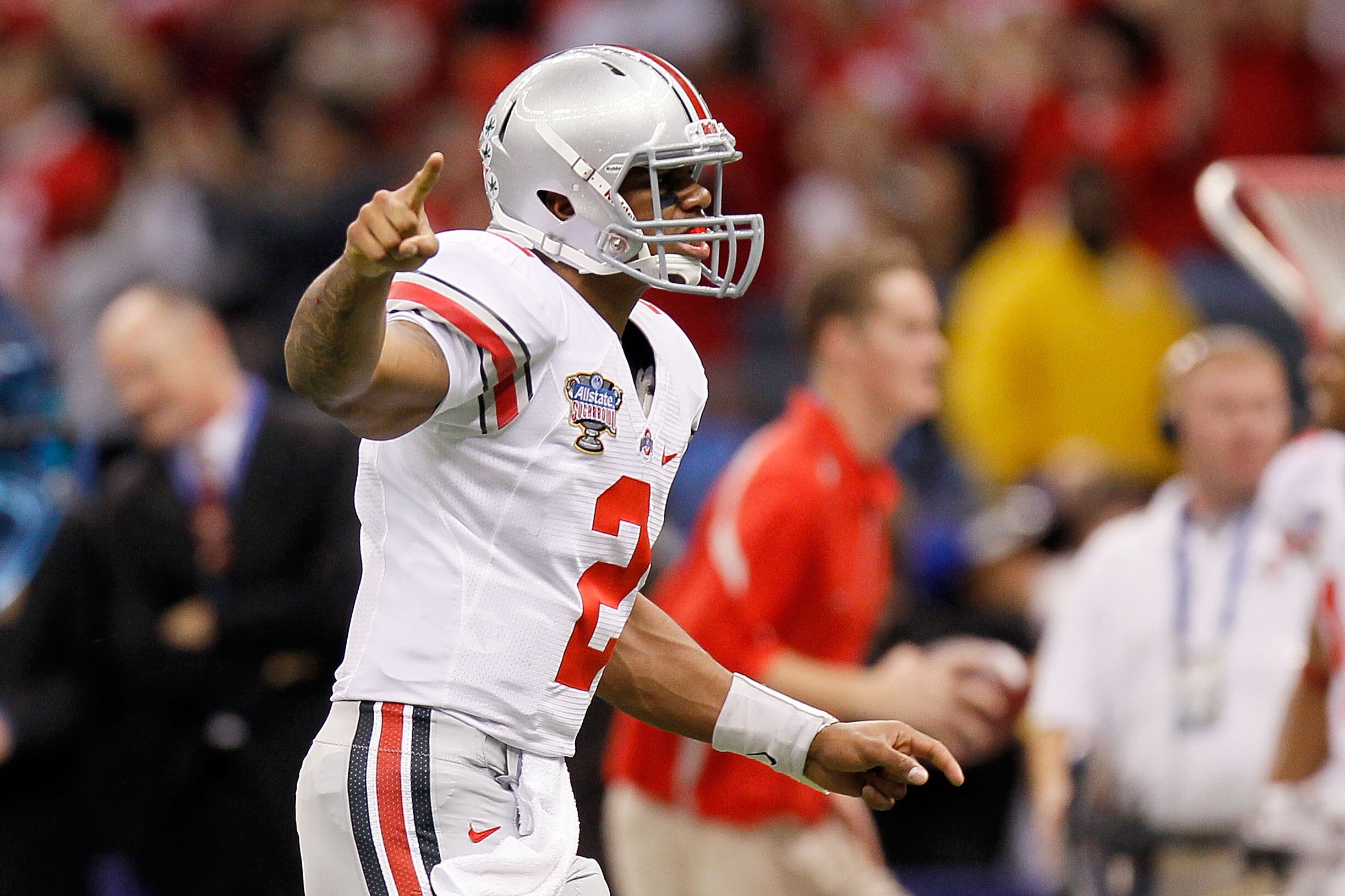 NEW ORLEANS, LA - JANUARY 04:  Quarterback Terrelle Pryor #2 of the Ohio State Buckeyes reacts after throwing a touchdown pass to DeVier Posey #8 in the second quarter against the Arkansas Razorbacks during the Allstate Sugar Bowl at the Louisiana Superdo