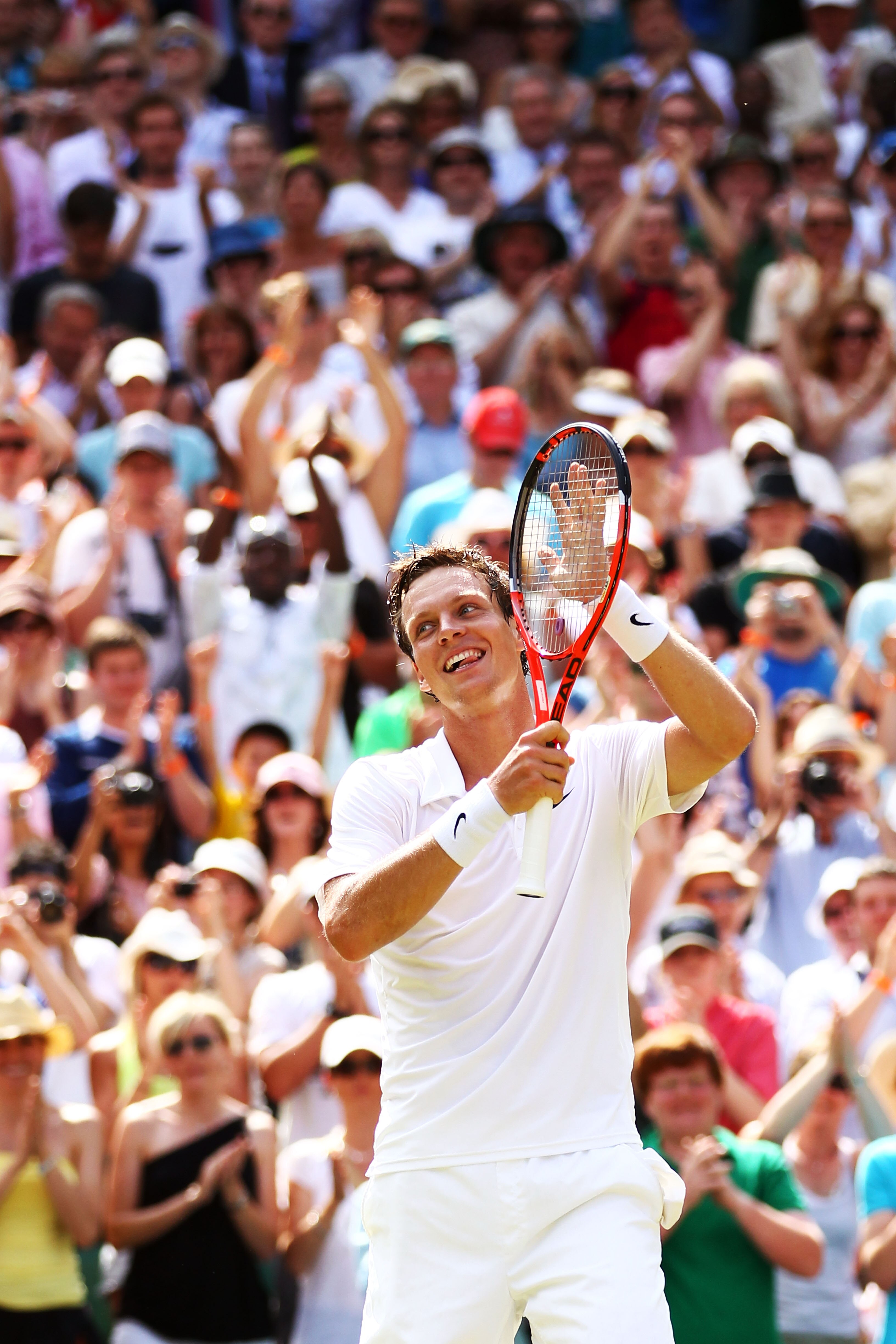 LONDON, ENGLAND - JUNE 30:  Tomas Berdych of Czech Republic celebrates match point during his Quarter Final match against Roger Federer of Switzerland on Day Nine of the Wimbledon Lawn Tennis Championships at the All England Lawn Tennis and Croquet Club o