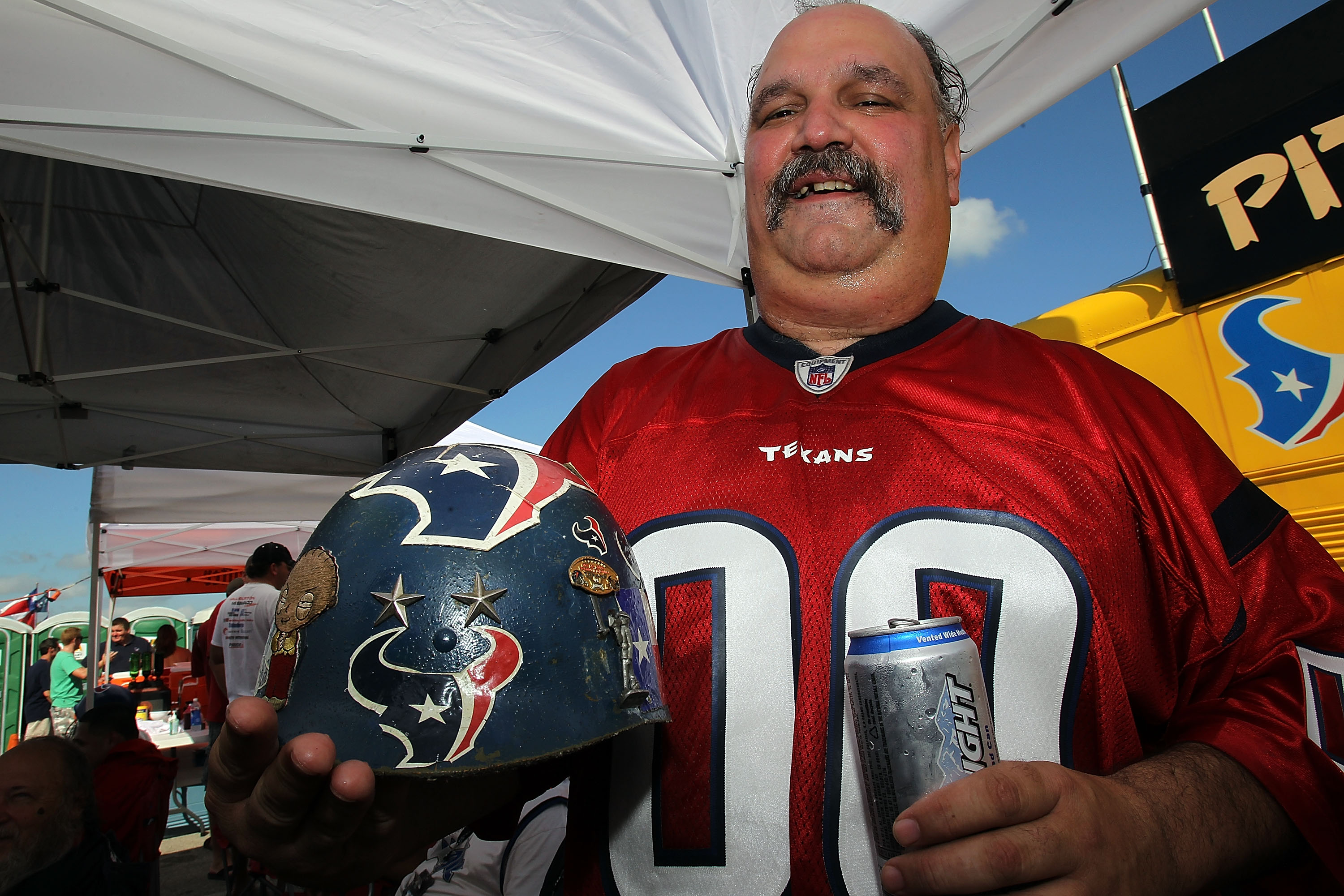 HOUSTON - SEPTEMBER 12:  Greg Duncan of Houston, TX holds his Texans helmet while tailgating before the NFL season opener game between the Indianapolis Colts and Houston Texans at Reliant Stadium on September 12, 2010 in Houston, Texas.  (Photo by Ronald