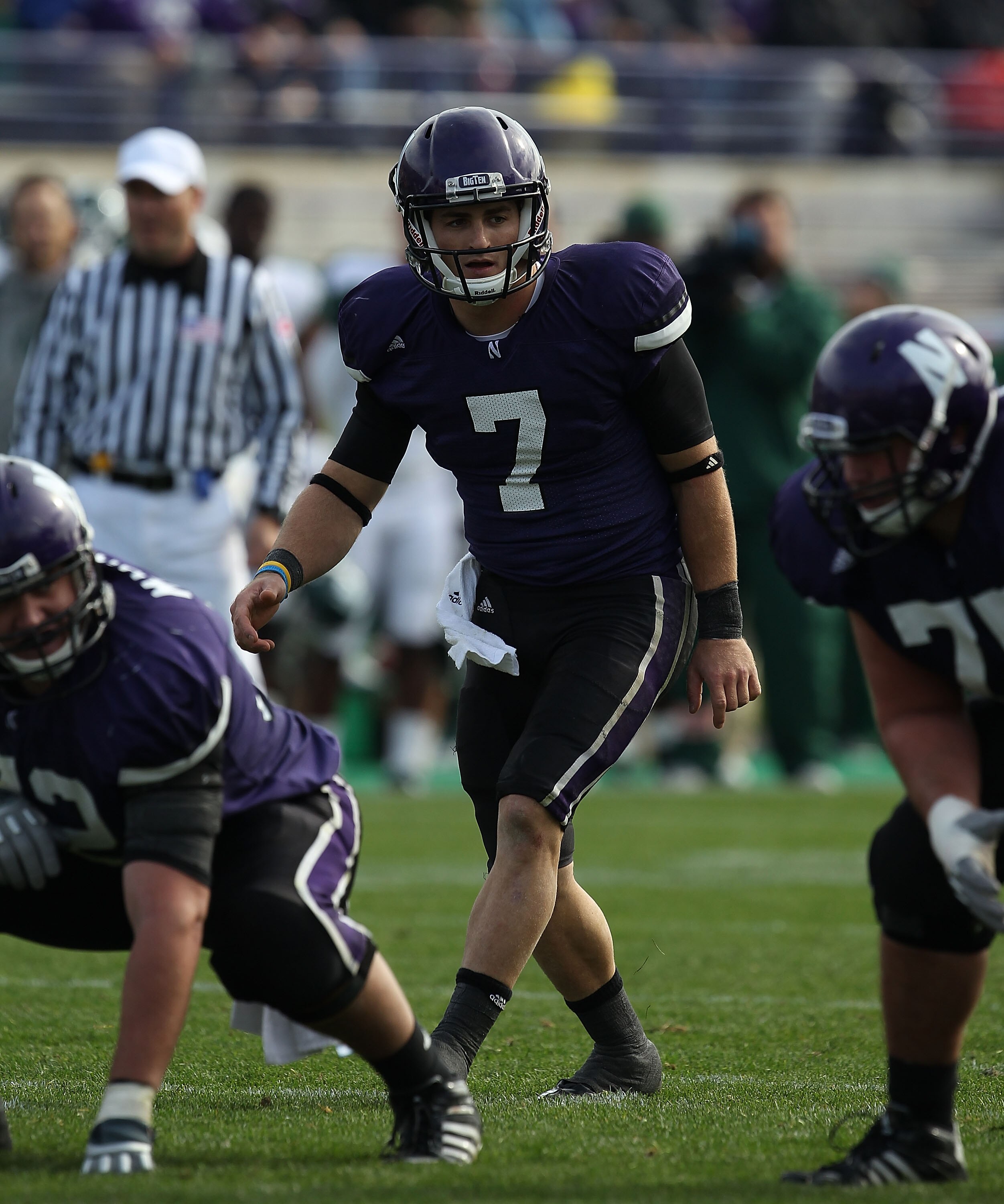 EVANSTON, IL - OCTOBER 23: Dan Persa #7 of the Northwestern Wildcats calls play signals against the Michigan State Spartans at Ryan Field on October 23, 2010 in Evanston, Illinois. Michigan State defeated Northwestern 35-27. (Photo by Jonathan Daniel/Gett