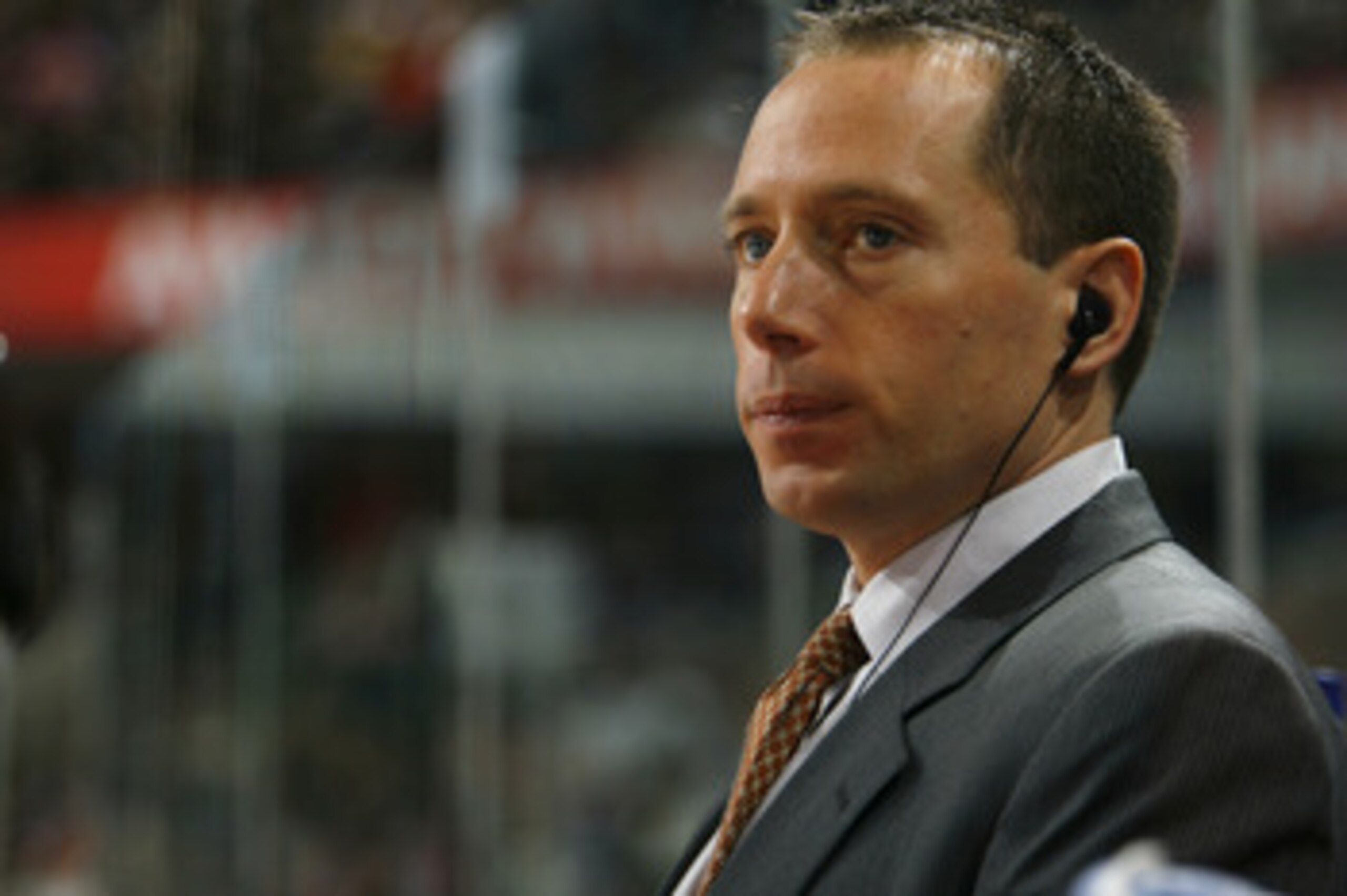 OTTAWA, CANADA - MARCH 15:  Assistant coach Greg Carvel of the Ottawa Senators watches from the bench during a game against the New York Islanders on March 15, 2007 at the Scotiabank Place in Ottawa, Canada. The Senators won 5-2.  (Photo by Phillip MacCal