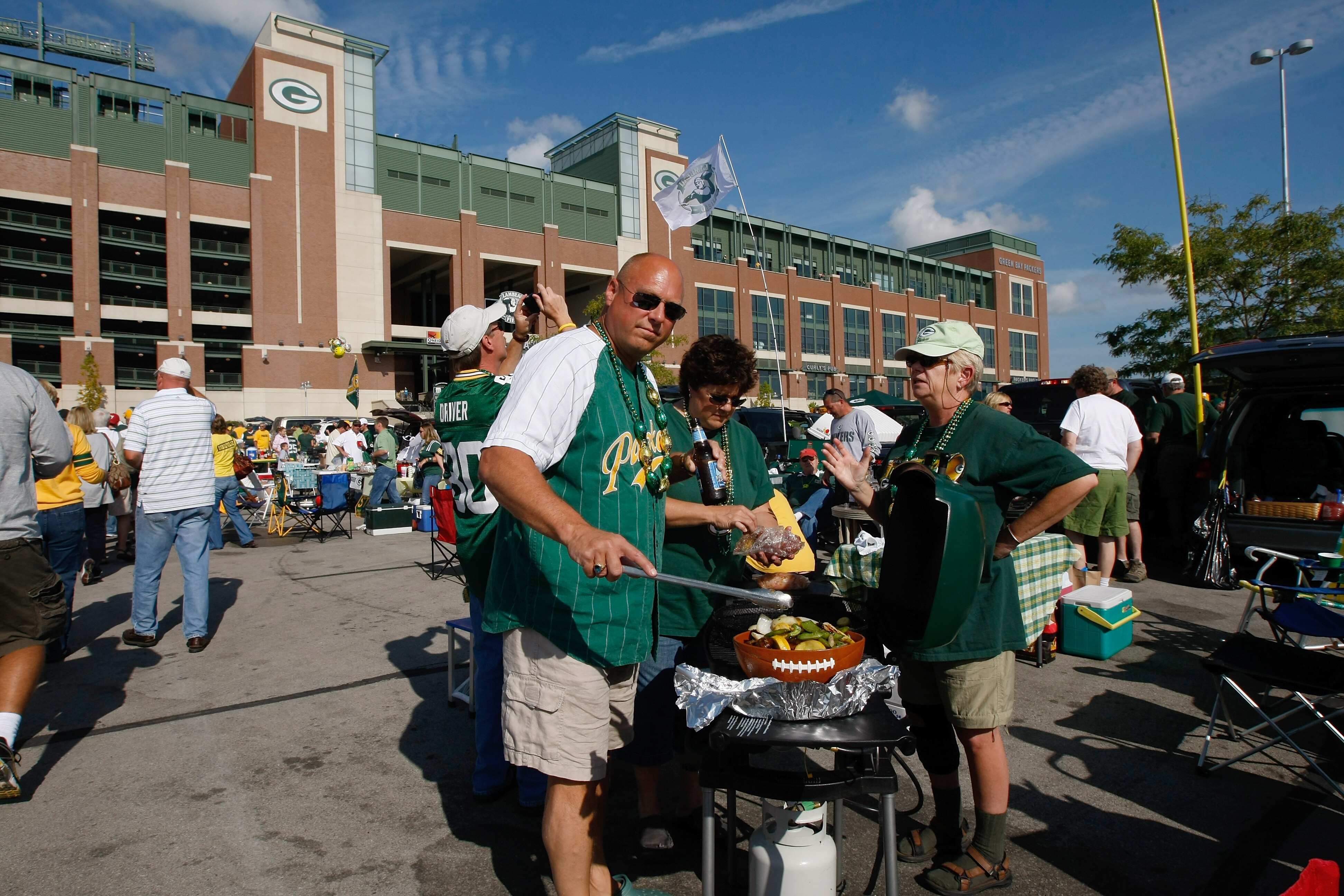 GREEN BAY, WI - SEPTEMBER 20: Fans tailgate in the parking lot outside of Lambeau Field prior to the game between the  Green Bay Packers against the Cincinnati Bengals at Lambeau Field on September 20, 2009 in Green Bay, Wisconsin. (Photo by Scott Boehm/G