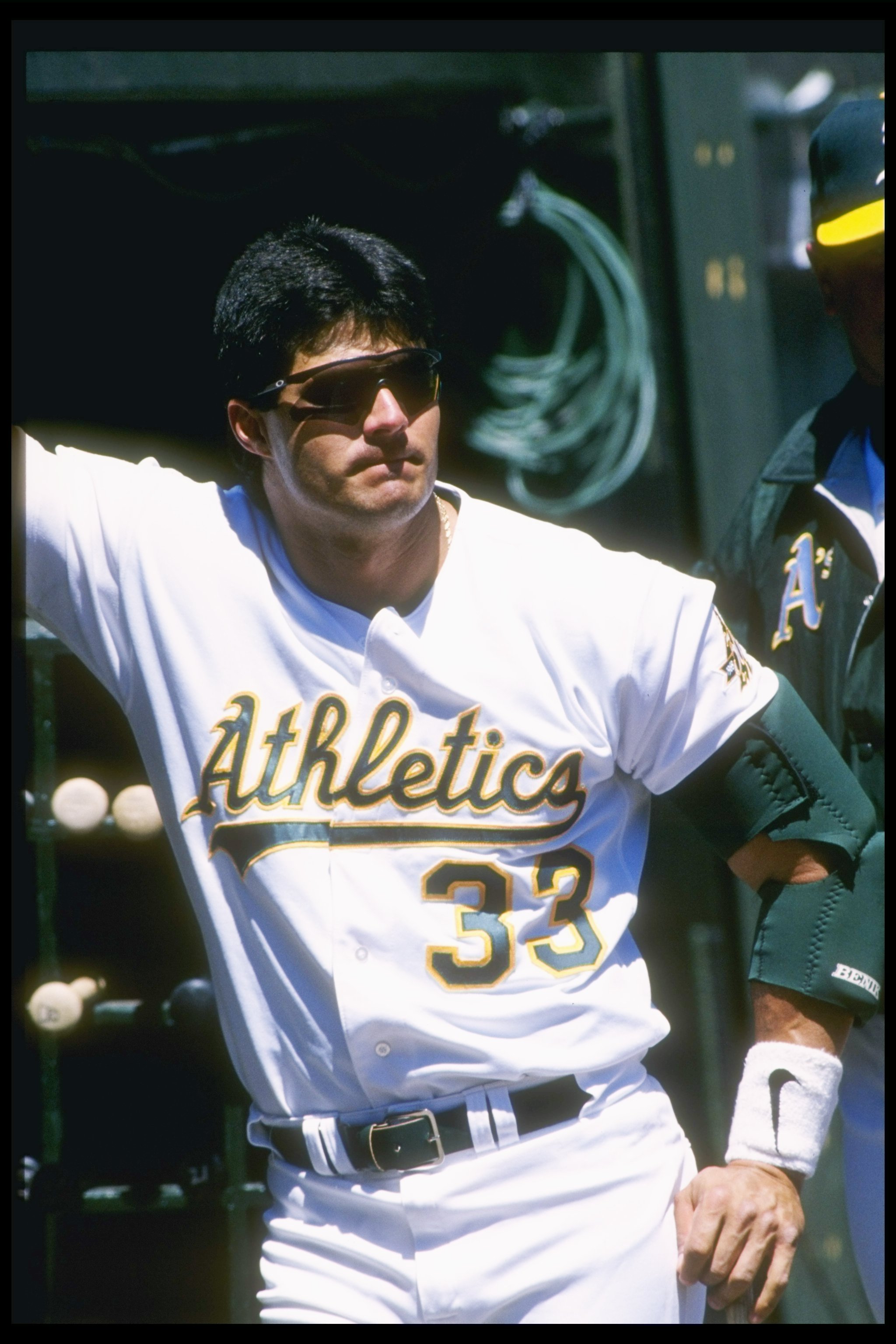 24 Apr 1997: Outfielder Jose Canseco of the Oakland Athletics stands on the field during a game against the Minnesota Twins at the Oakland Coliseum in Oakland, California. The Athletics won the game 12-11.