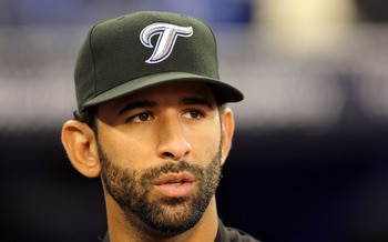 TORONTO,CANADA - APRIL 1:  Jose Bautista #19 of the Toronto Blue Jays gives an interview prior to the home opener for the Toronto Blue Jays as they face the Minnesota Twins during their MLB game at the Rogers Centre April 1, 2011 in Toronto, Ontario, Cana