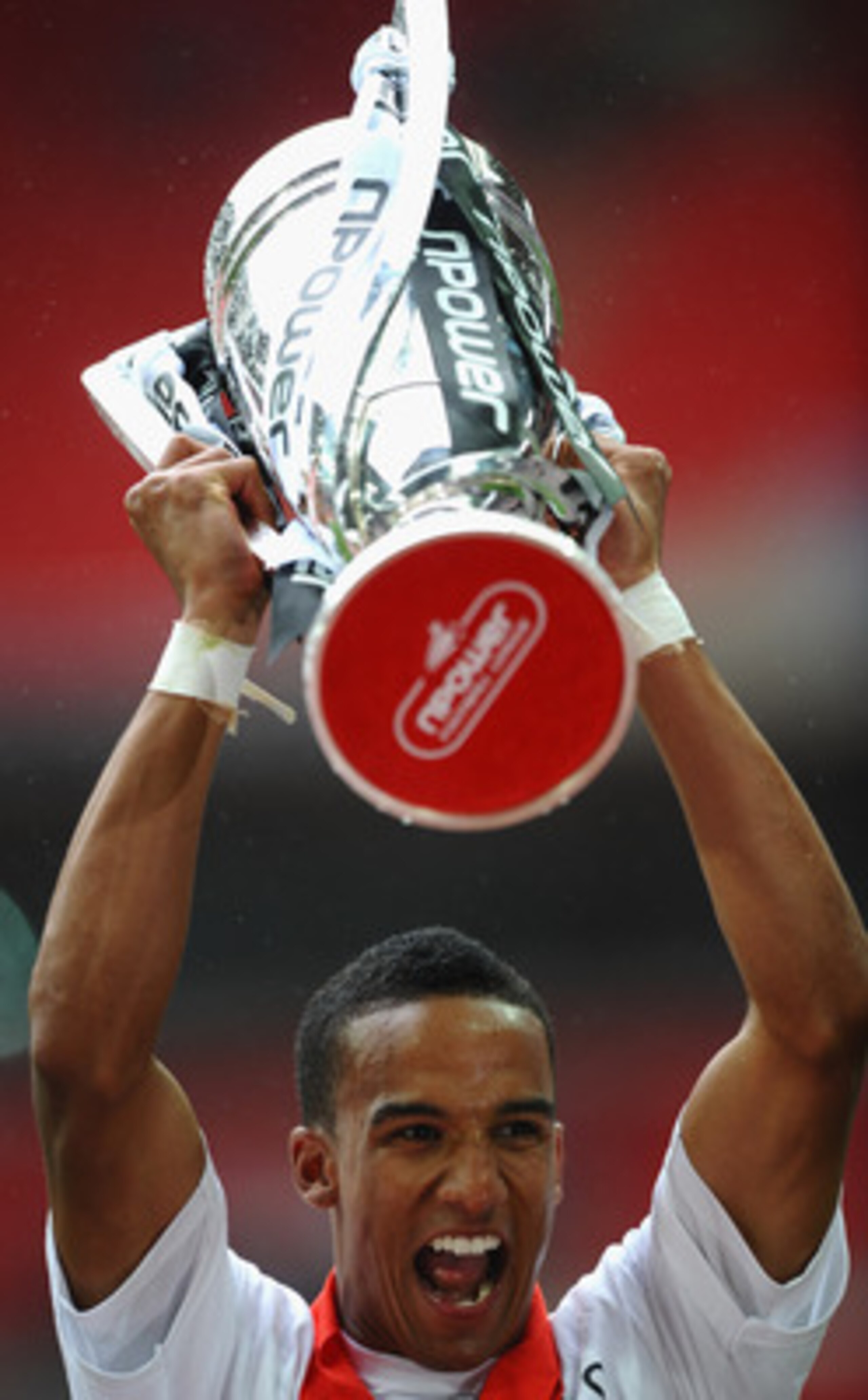 LONDON, ENGLAND - MAY 30:  Scott Sinclair of Swansea celebrates with the trophy after victory in the npower Championship Playoff Final between Reading and Swansea City at Wembley Stadium on May 30, 2011 in London, England.  (Photo by Laurence Griffiths/Ge