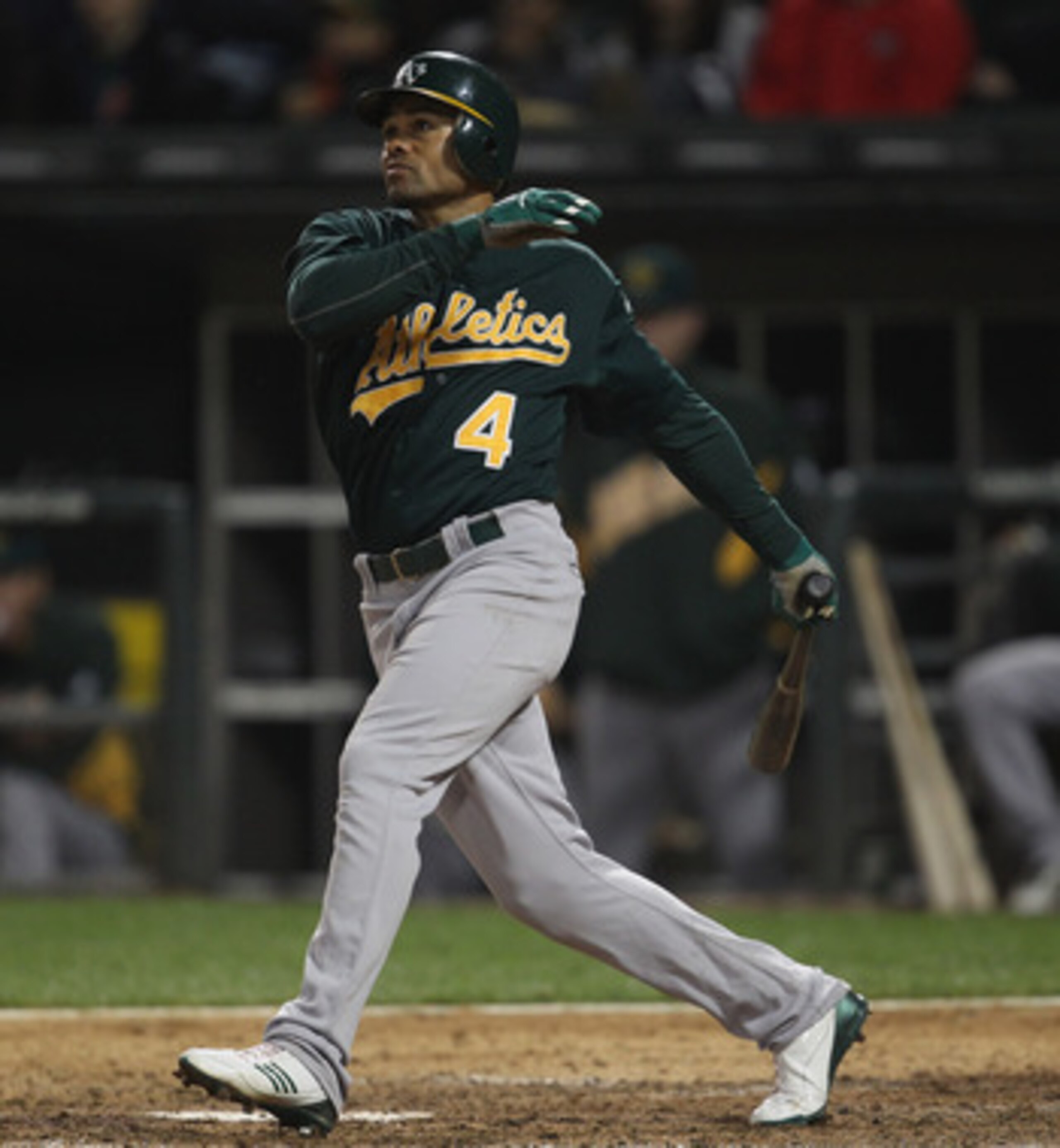 CHICAGO, IL - JUNE 10: Coco Crisp #4 of the Oakland Athletics hits the ball against the Chicago White Sox at U.S. Cellular Field on June 10, 2011 in Chicago, Illinois. The Athletics defeated the White Sox 7-5. (Photo by Jonathan Daniel/Getty Images)