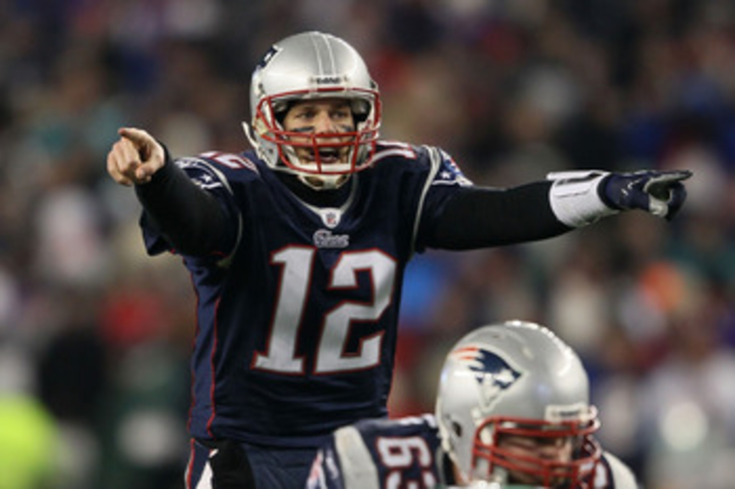 FOXBORO, MA - JANUARY 16:  Quarterback Tom Brady #12 of the New England Patriots signals during their 2011 AFC divisional playoff game against the New York Jets at Gillette Stadium on January 16, 2011 in Foxboro, Massachusetts.  (Photo by Elsa/Getty Image