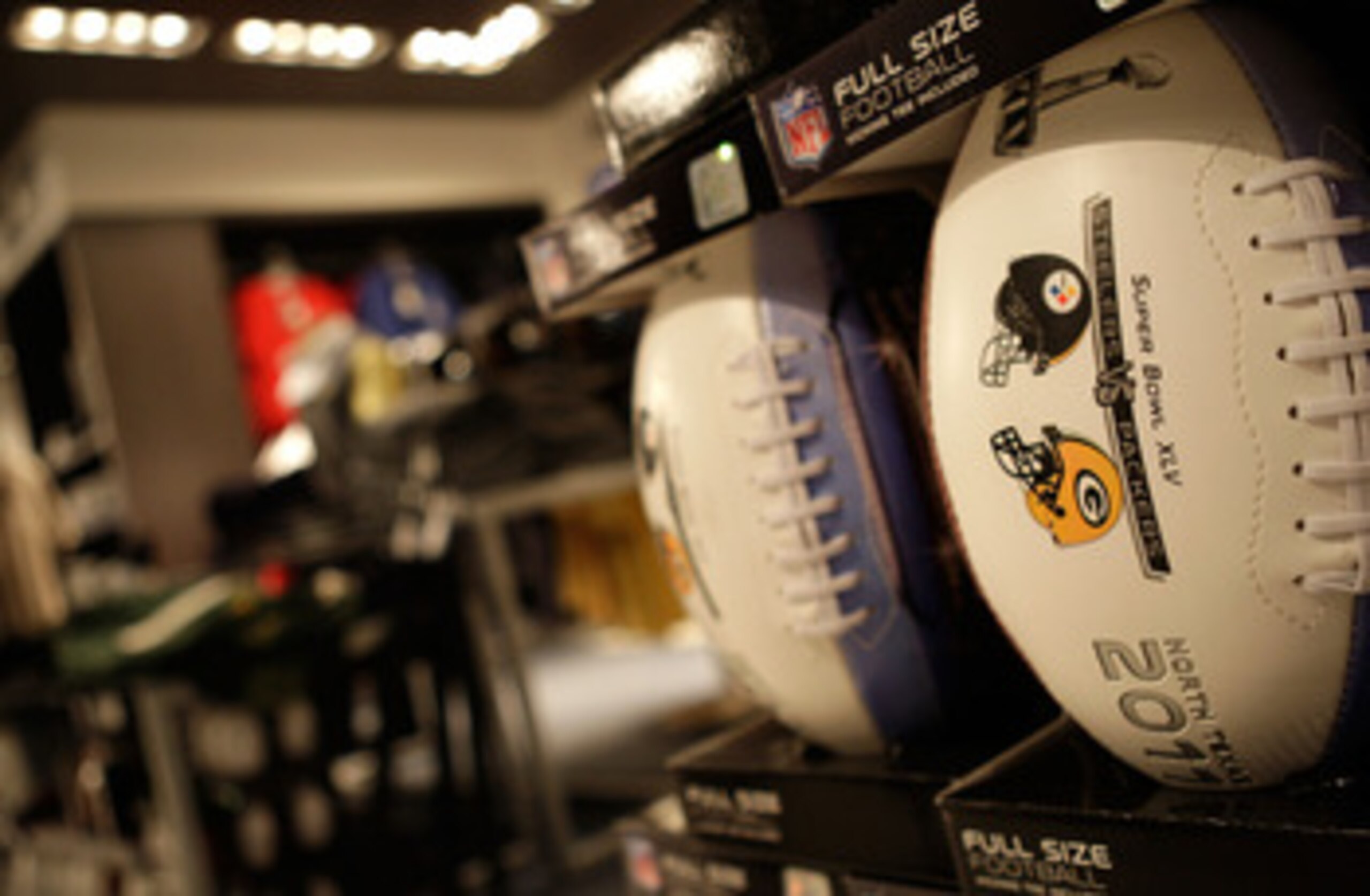 ARLINGTON, TX - FEBRUARY 06:  Offical Super Bowl XLV Footballs are sold during Super Bowl XLV between the Green Bay Packers and the Pittsburgh Steelers at Cowboys Stadium on February 6, 2011 in Arlington, Texas.  (Photo by Jamie Squire/Getty Images)