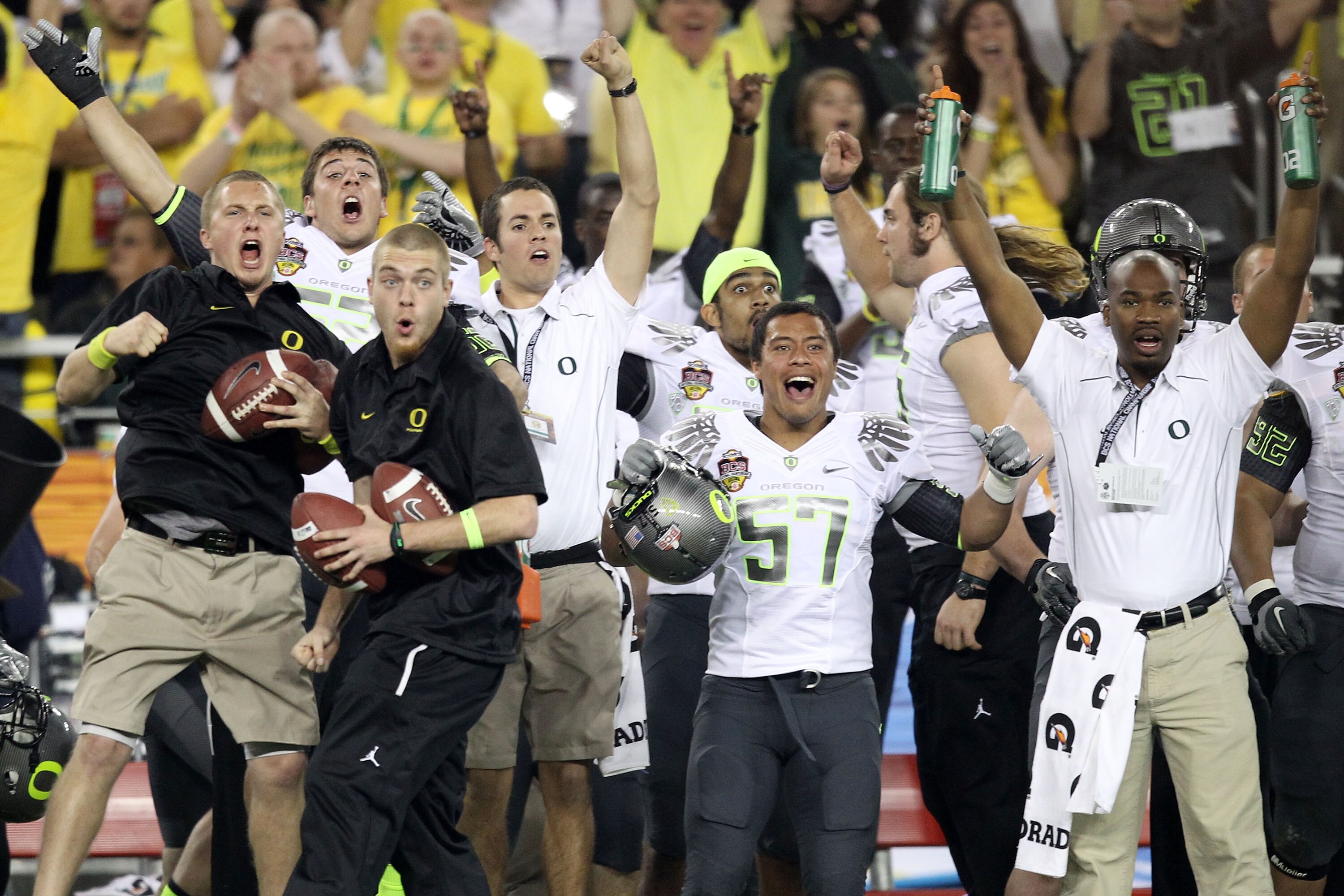 GLENDALE, AZ - JANUARY 10: Keloni Kamalani #57 of the Oregon Ducks and his teammates react during during the Tostitos BCS National Championship Game against the Auburn Tigers at University of Phoenix Stadium on January 10, 2011 in Glendale, Arizona. (Ph GLENDALE, AZ - JANUARY 10: Keloni Kamalani #57 of the Oregon Ducks and his teammates react during during the Tostitos BCS National Championship Game against the Auburn Tigers at University of Phoenix Stadium on January 10, 2011 in Glendale, Arizona. (Ph