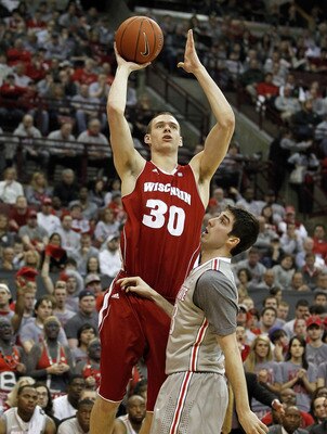COLUMBUS, OH - MARCH 06:  Jon Leuer #30 of the Wisconsin Badgers shoots over Jon Diebler #33 of the Ohio State Buckeyeson March 6, 2011 at the Value City Arena in Columbus, Ohio.  (Photo by Gregory Shamus/Getty Images)