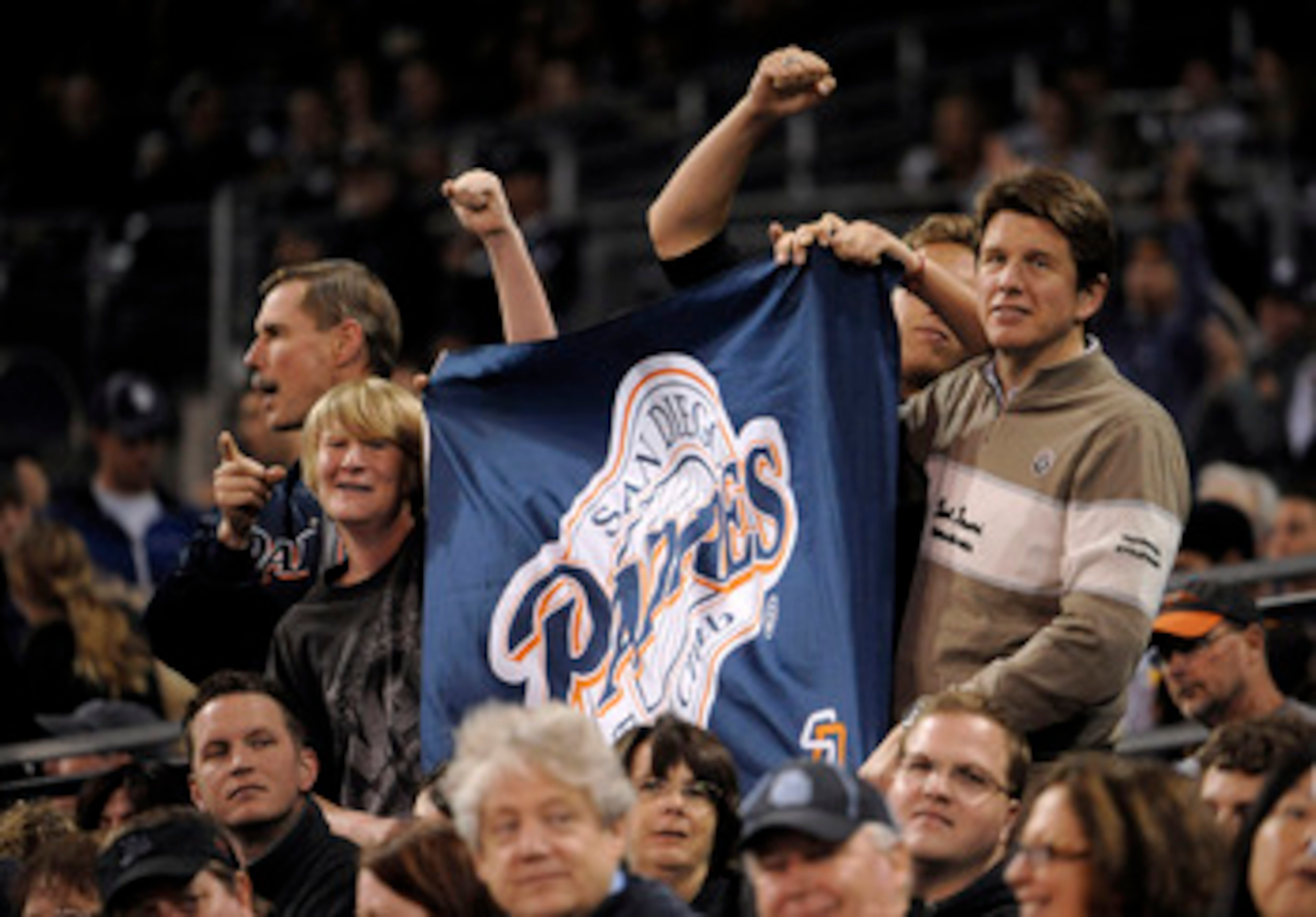 SAN DIEGO, CA - JUNE 10:  San Diego Padres fans hold up a banner during the eighth inning of a baseball game against the Washington Nationals at Petco Park on June 10, 2011 in San Diego, California.  The Nationals won 2-1.  (Photo by Denis Poroy/Getty Ima