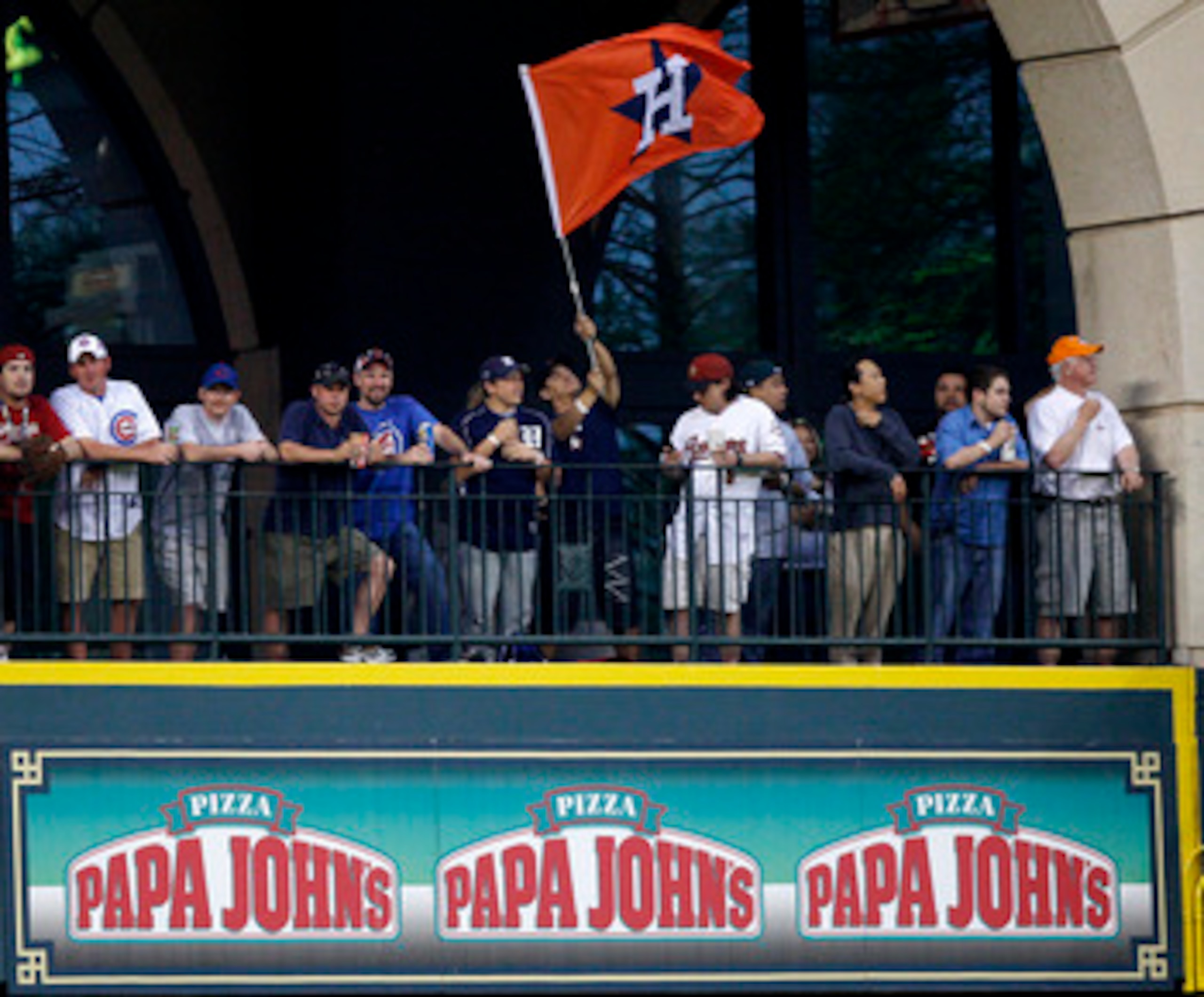 HOUSTON - APRIL 12:  Fans wave an Astros flag in center field at Minute Maid Park on April 12, 2011 in Houston, Texas.  (Photo by Bob Levey/Getty Images)