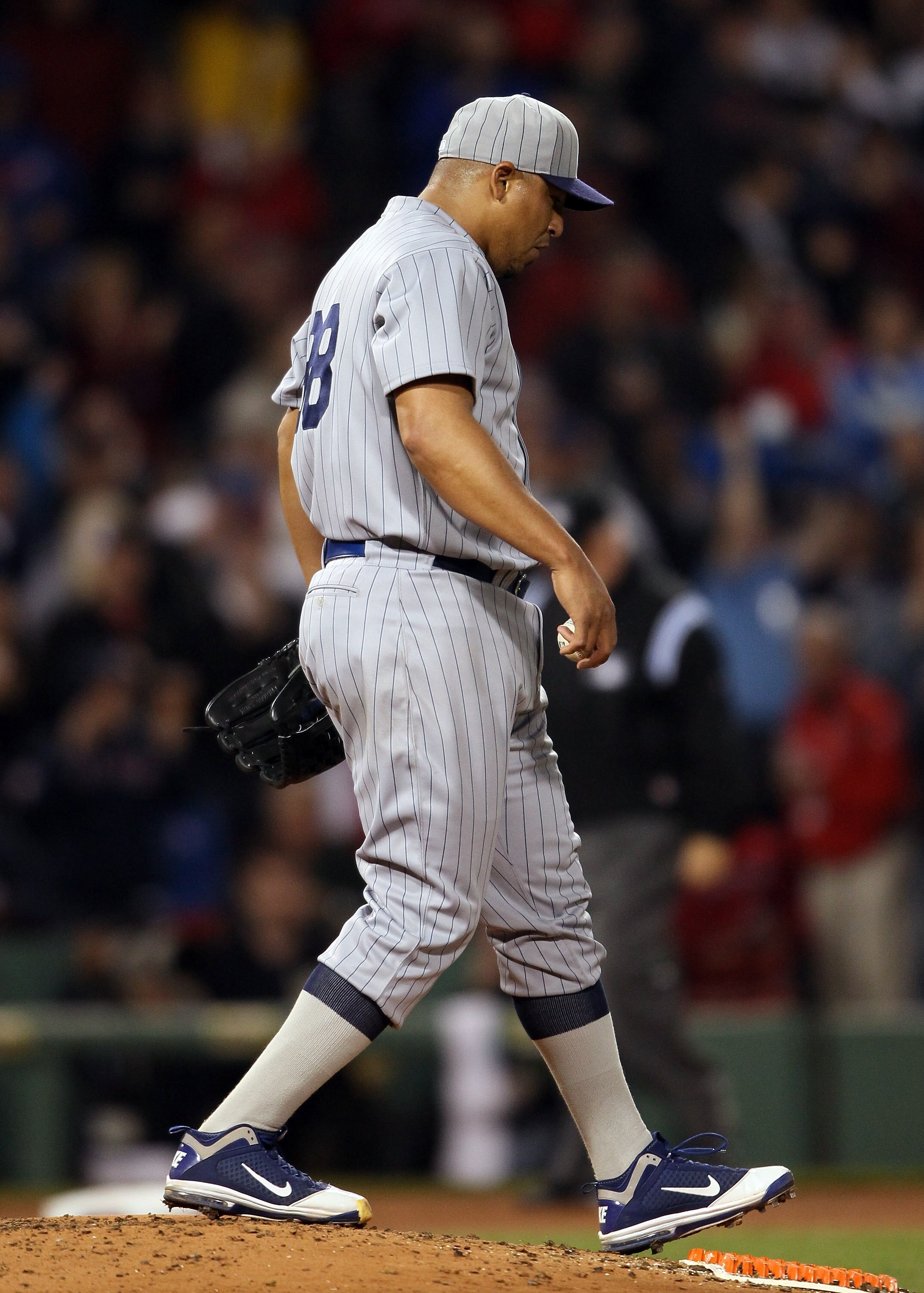 BOSTON, MA - MAY 21:  Carlos Zambrano #38 of the Chicago Cubs reacts after giving up a two run homer to David Ortiz outfield the Boston Red Sox on May 21, 2011 at Fenway Park in Boston, Massachusetts. Tonight the Chicago Cubs and the Boston Red Sox are we
