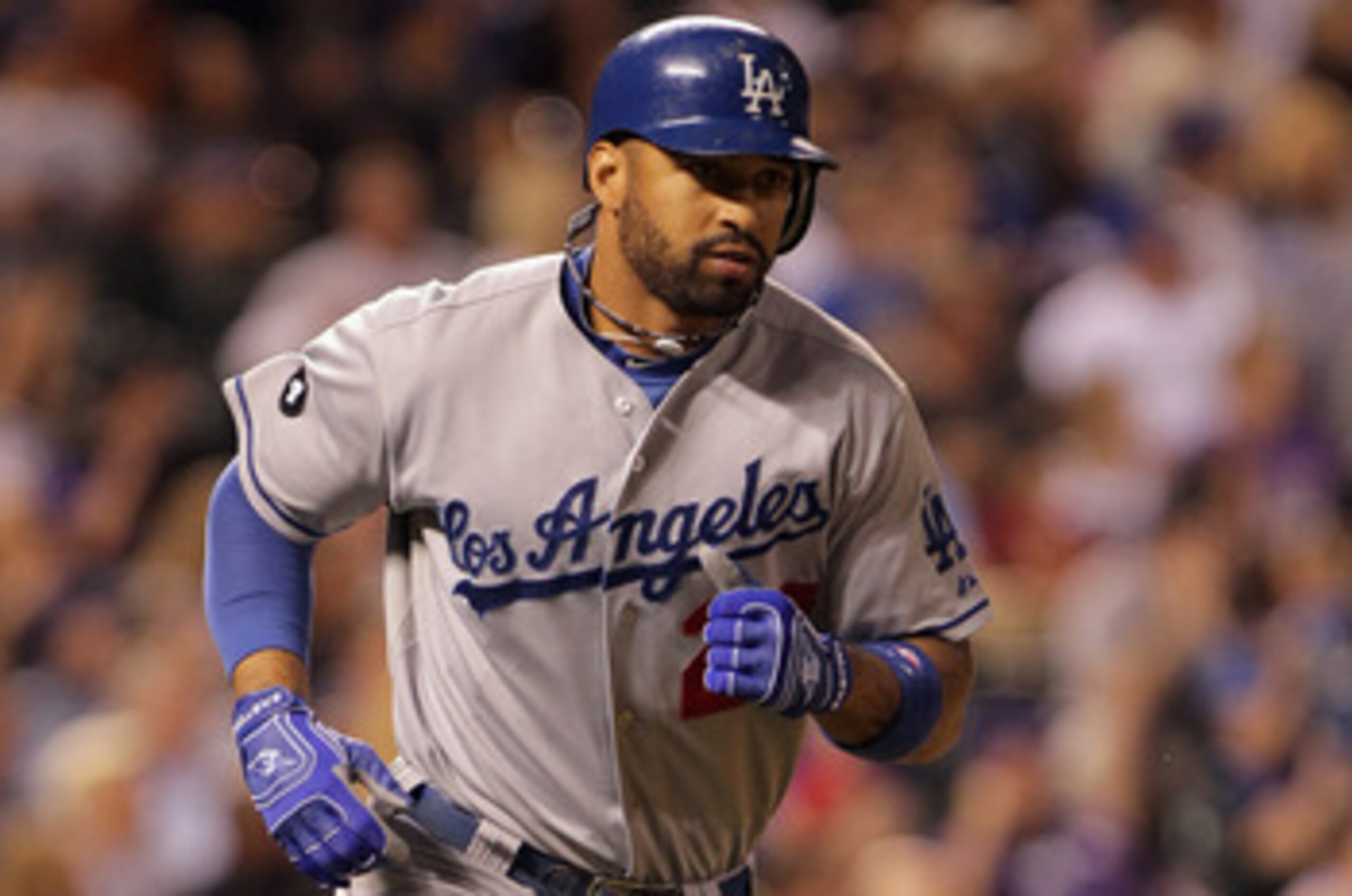 DENVER, CO - JUNE 10:  Matt Kemp #27 of the Los Angeles Dodgers rounds the bases as he hit a solo homerun off of Matt Belisle #34 of the Colorado Rockies in the ninth inning at Coors Field on June 10, 2011 in Denver, Colorado. The Rockies defeated the Dod