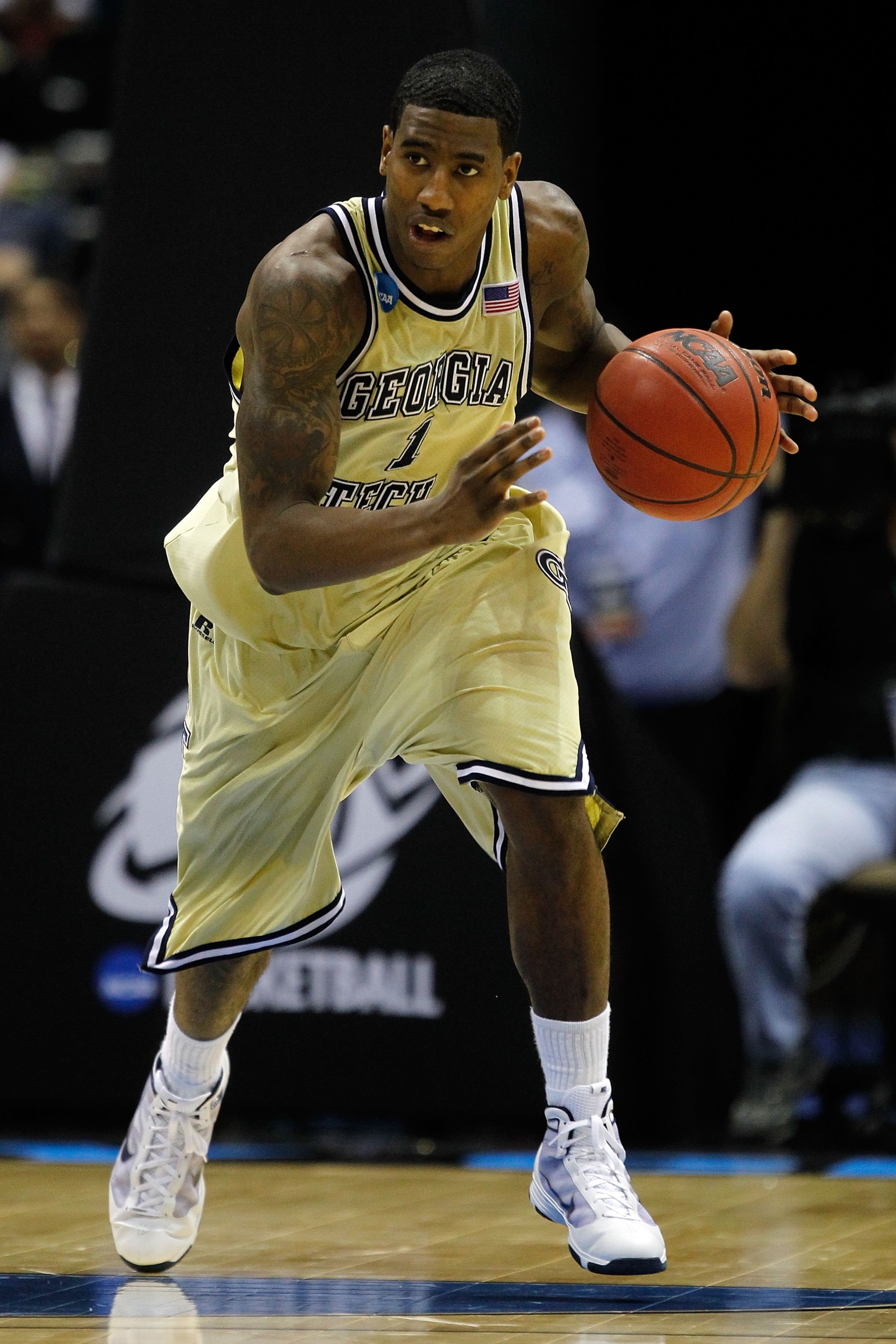 MILWAUKEE - MARCH 19:  Iman Shumpert #1 of the Georgia Tech Yellow Jackets moves the ball against the Oklahoma State Cowboys during the first round of the 2010 NCAA men's basketball tournament at the Bradley Center on March 19, 2010 in Milwaukee, Wisconsi