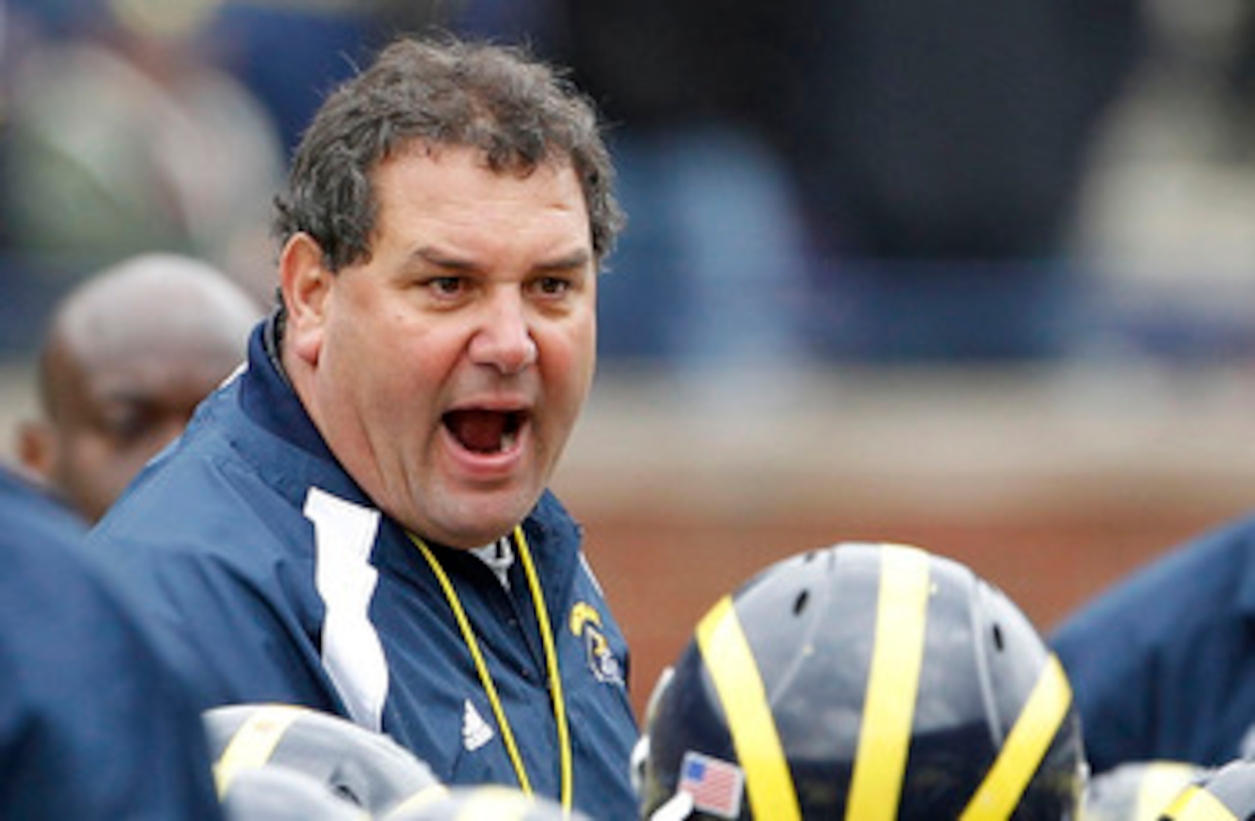 ANN ARBOR, MI - APRIL 16: Head football coach Brady Hoke talks with his team during the annual Spring Game at Michigan Stadium on April 16, 2011 in Ann Arbor, Michigan. (Photo by Leon Halip/Getty Images) ANN ARBOR, MI - APRIL 16: Head football coach Brady Hoke talks with his team during the annual Spring Game at Michigan Stadium on April 16, 2011 in Ann Arbor, Michigan. (Photo by Leon Halip/Getty Images)