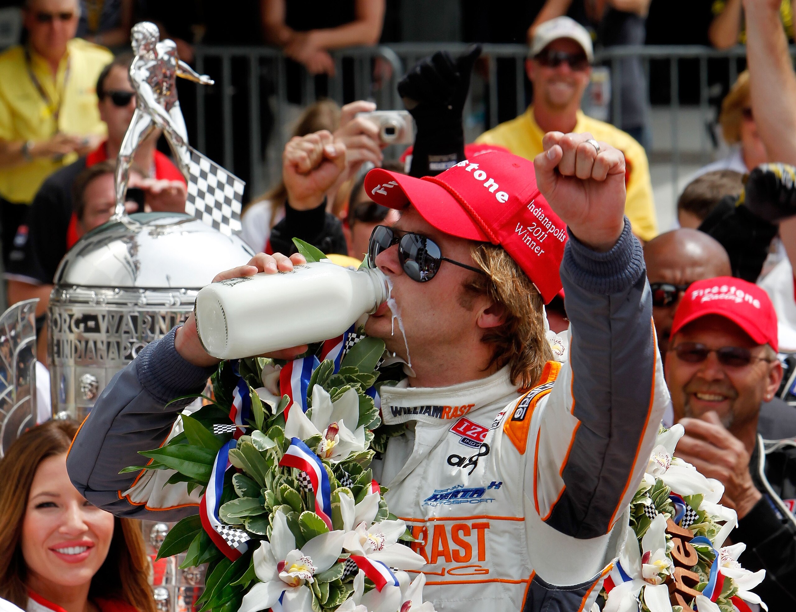 INDIANAPOLIS, IN - MAY 29:  Dan Wheldon of England, driver of the #98 William Rast-Curb/Big Machine Dallara Honda, celebrates in victory lane after winning the IZOD IndyCar Series Indianapolis 500 Mile Race at Indianapolis Motor Speedway on May 29, 2011 i