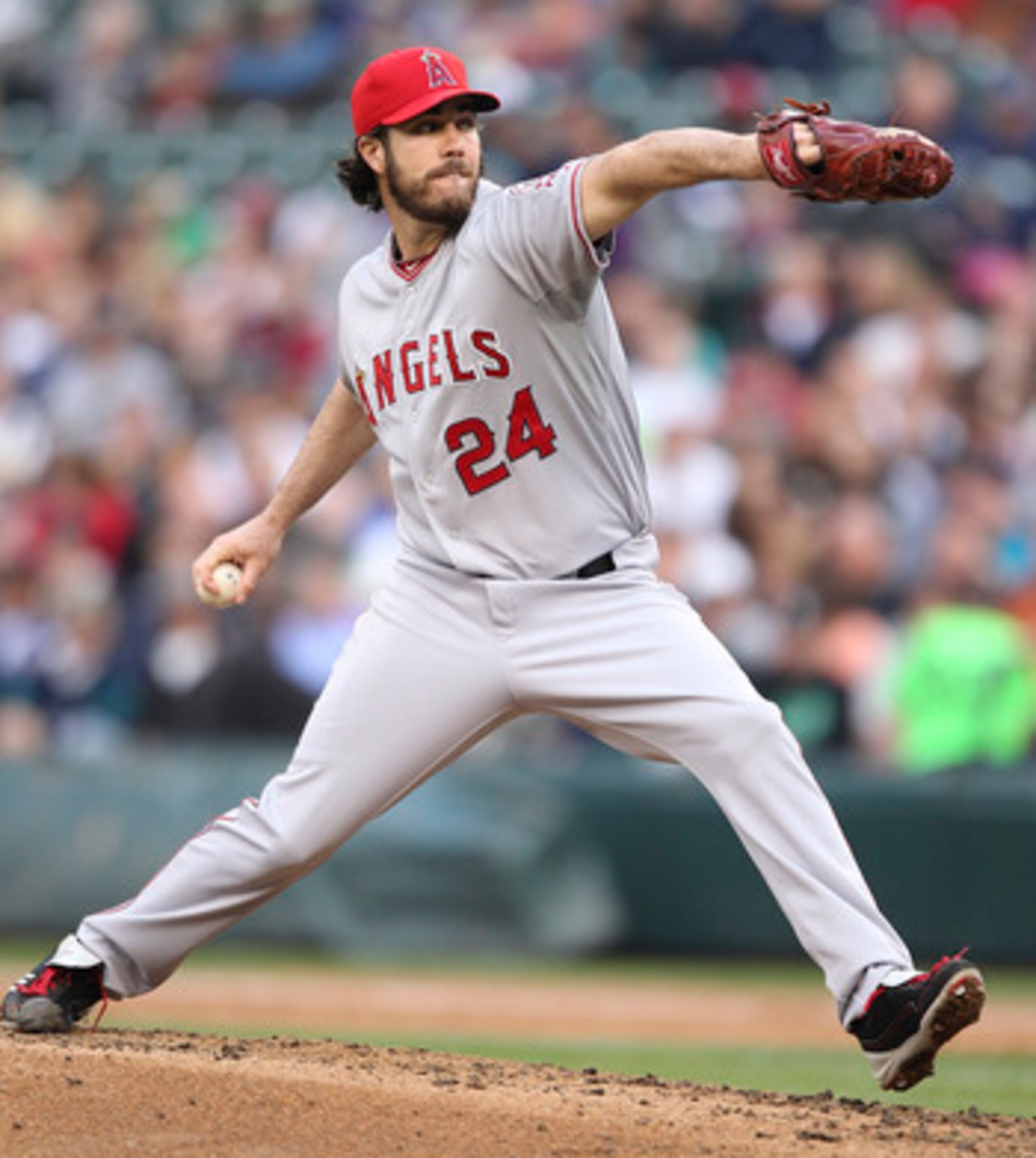 SEATTLE - JUNE 13:  Starting pitcher Dan Haren #24 of the Los Angeles Angels of Anaheim pitches against the Seattle Mariners at Safeco Field on June 13, 2011 in Seattle, Washington. (Photo by Otto Greule Jr/Getty Images)