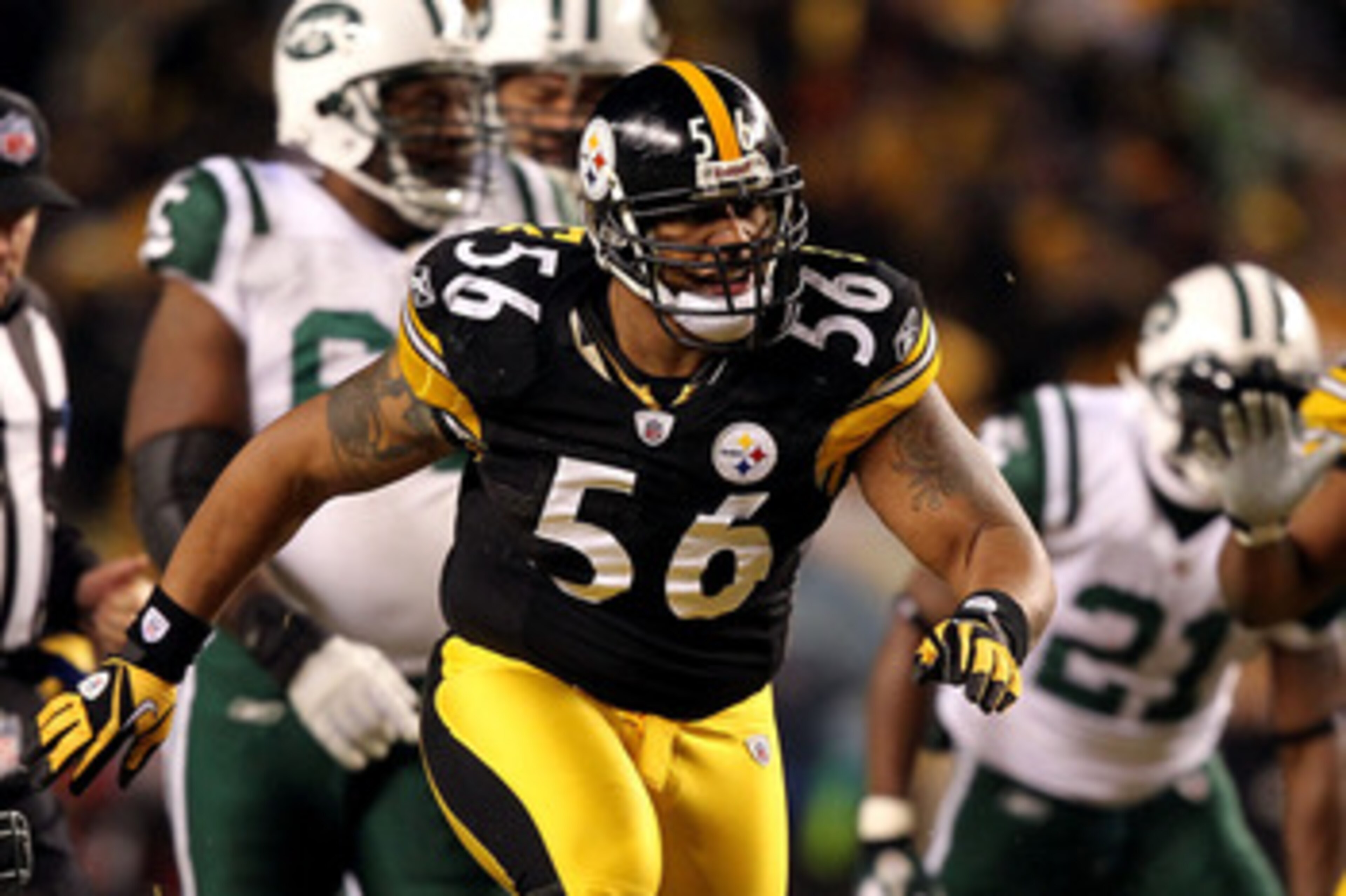 PITTSBURGH, PA - JANUARY 23:  LaMarr Woodley #56 of the Pittsburgh Steelers reacts after a sack against the New York Jets during the 2011 AFC Championship game at Heinz Field on January 23, 2011 in Pittsburgh, Pennsylvania. The Steelers won 24-19. (Photo 