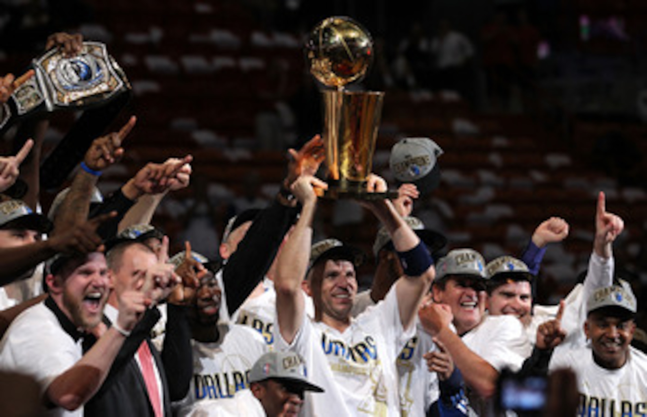 MIAMI, FL - JUNE 12:  Jason Kidd #2 of the Dallas Mavericks holds the Larry O'Brien trophy after the Mavericks won 105-95 against the Miami Heat in Game Six of the 2011 NBA Finals at American Airlines Arena on June 12, 2011 in Miami, Florida. NOTE TO USER